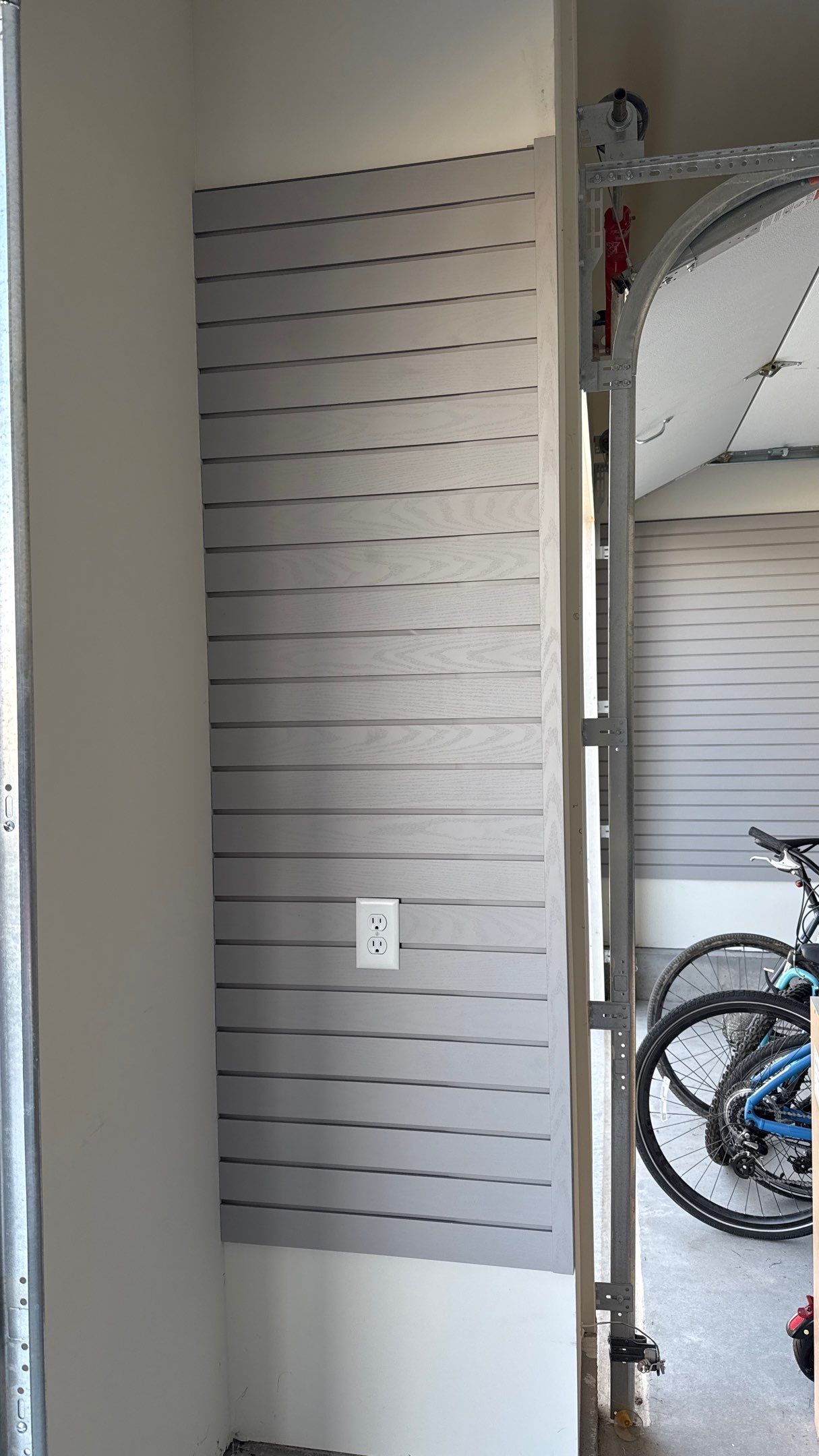 MKE Textured Grey Slatwall Creates A Perfect Storage Start  by Banner Garage