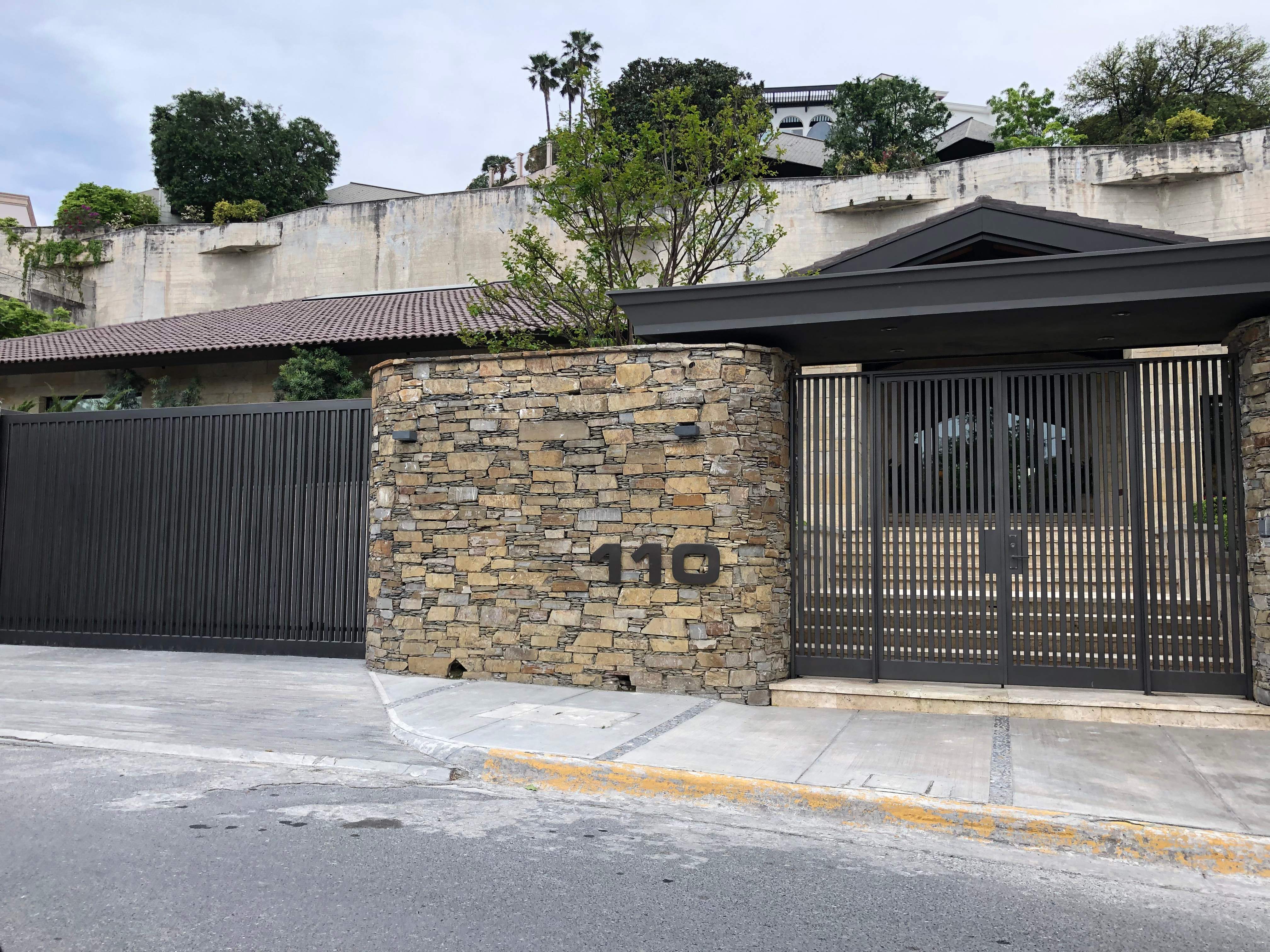 Custom Stone Entryway and Secure Perimeter Gate Installation in Monterrey by Solara Custom Living