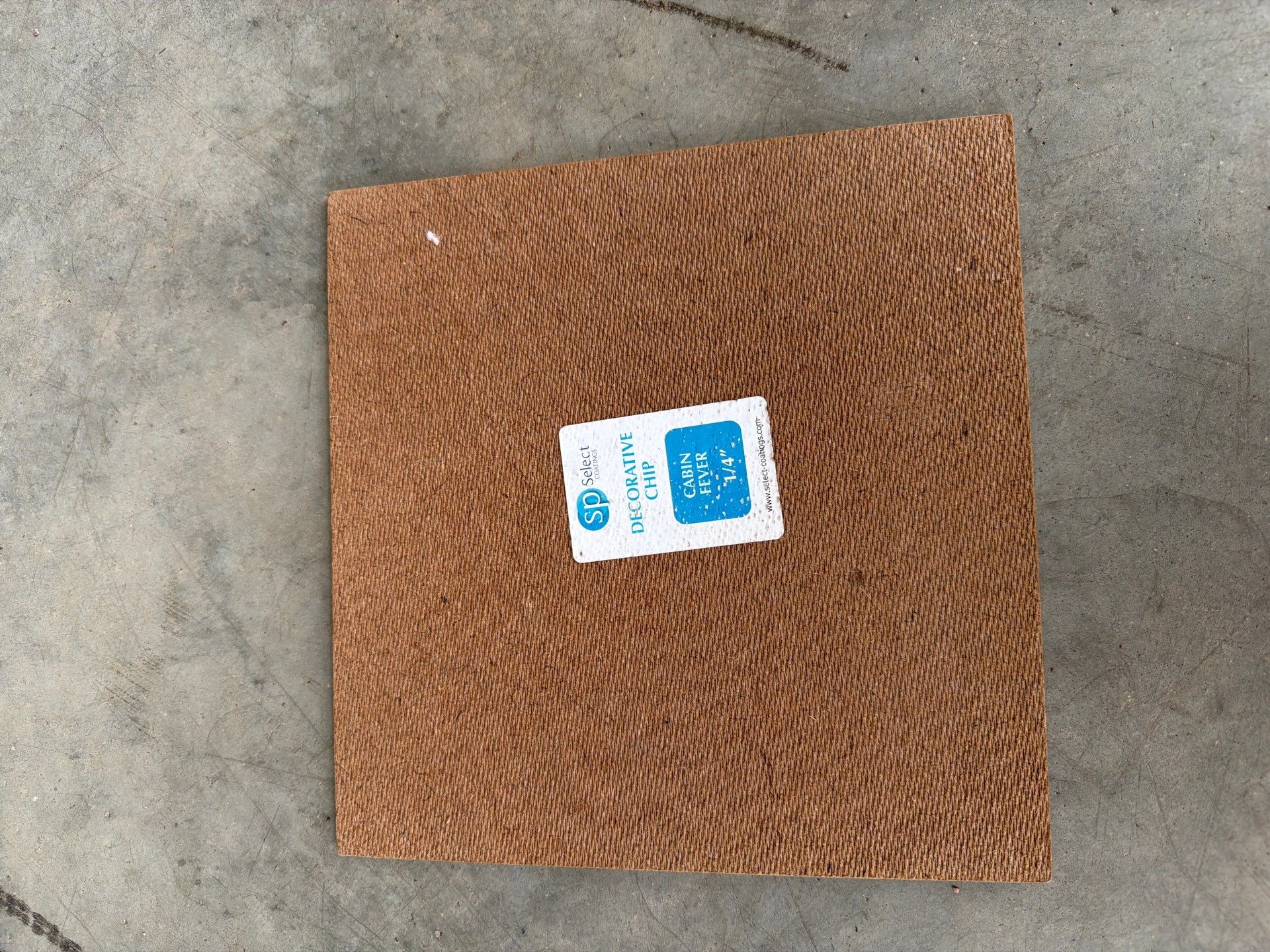 Cabin Fever Garage Floor Coating in Sioux Falls by Select Painting, Coatings & Garage Cabinets
