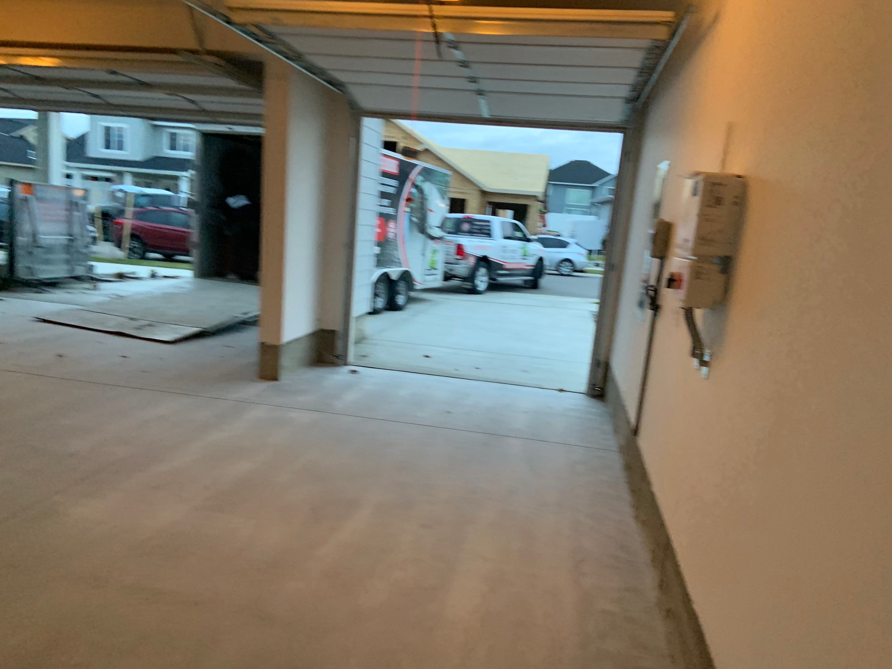 Garage Transformation using Domino with Blue by Croc Coatings, LLC