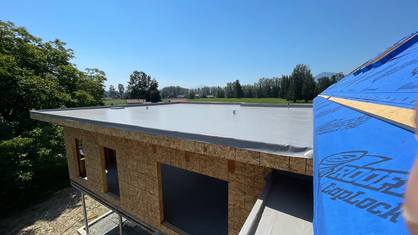 Residential Roofing Installation using multiple products by Top Notch Roofing Inc