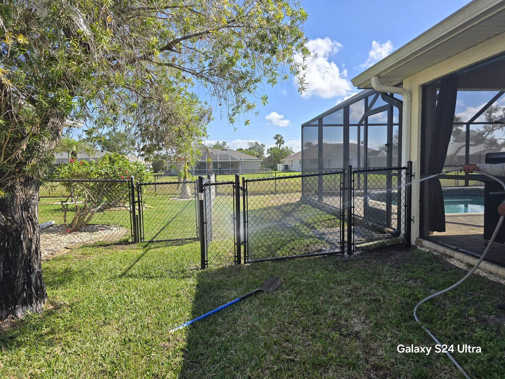Waterfront Black Chain Link Fence Installation in Rotonda West by True Fence LLC
