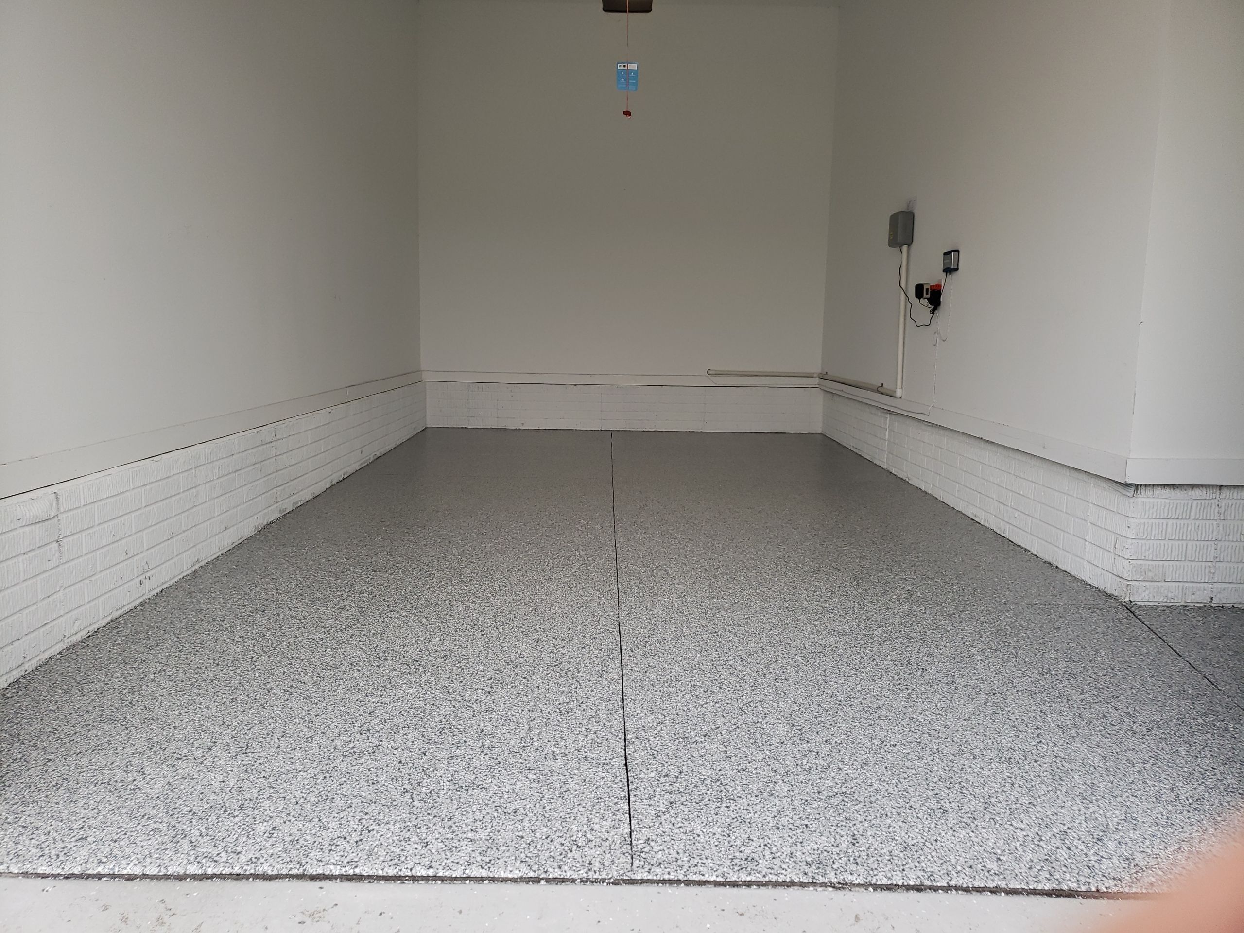 Waukee Slate Stone Garage Coating by Revival Concrete Coatings