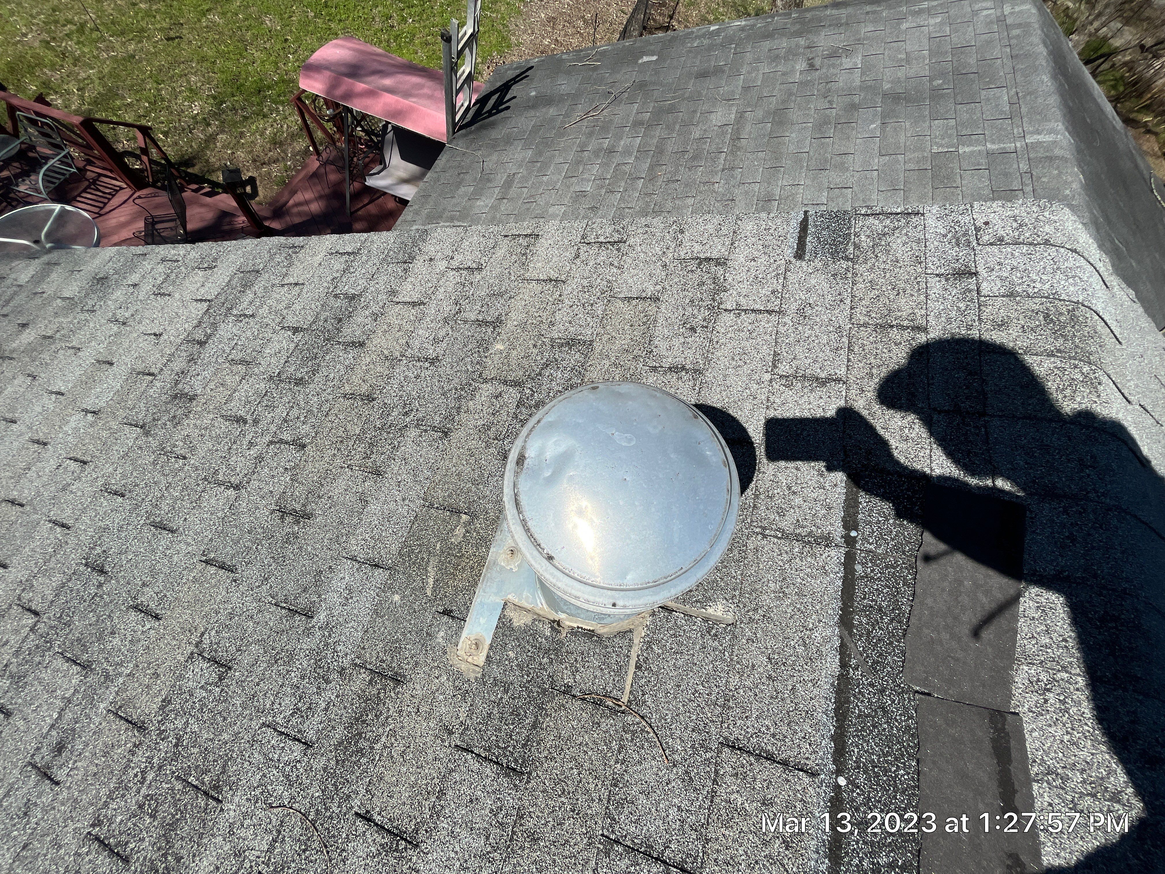 Residential Roofing Installation using 26 Gauge Colored Panels by Hostetler Roofing