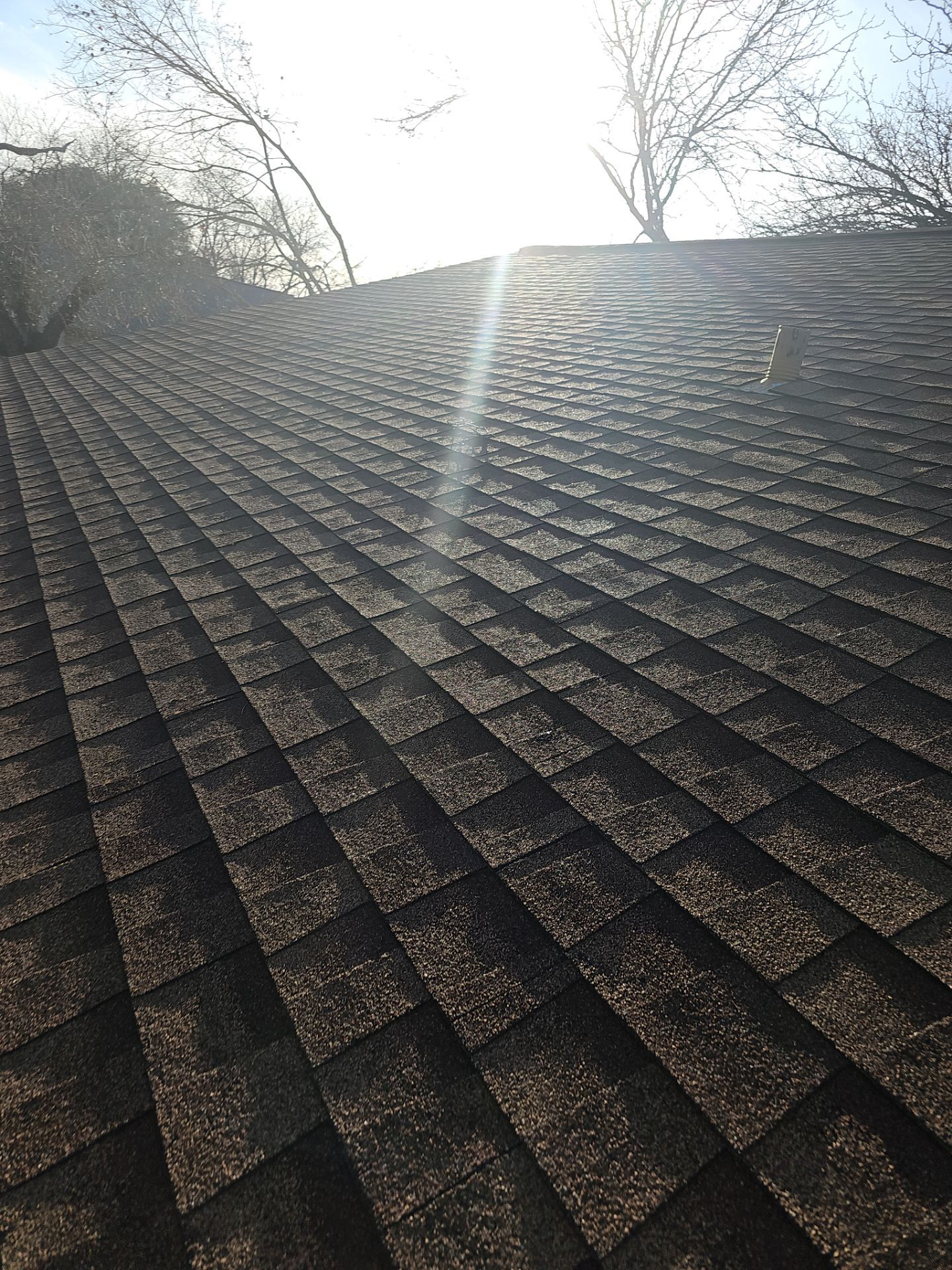 Residential Roofing Installation using Owens Corning Oakridge Brownwood by DeZign Roofing & Exteriors