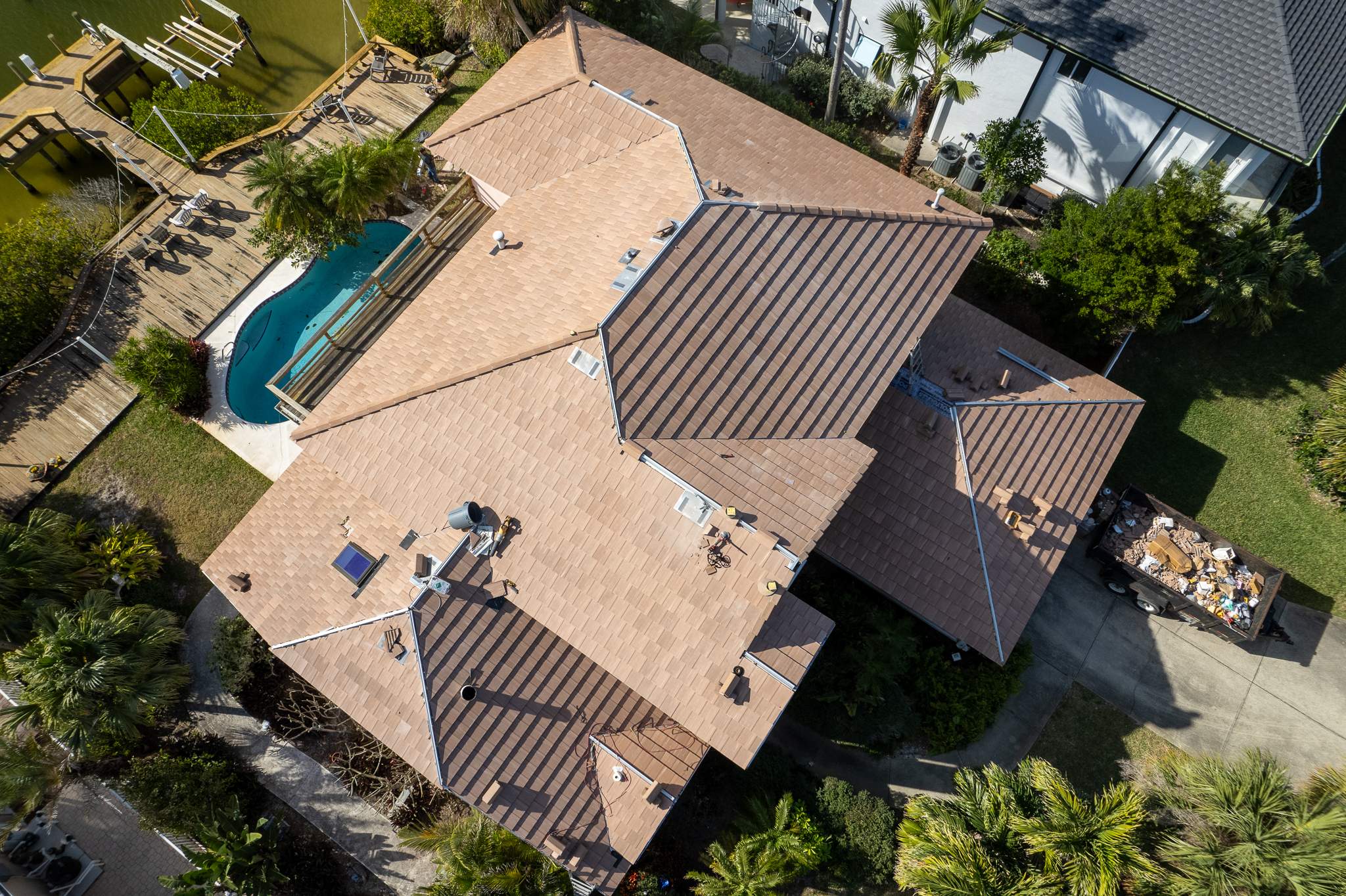 Full Clay Tile Roof Replacement and Deck Repair in Cocoa Beach, Florida by Wiedmann Construction & Roofing