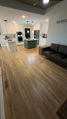 Hardwood Flooring Installation and Baseboard Trim in Grain Valley