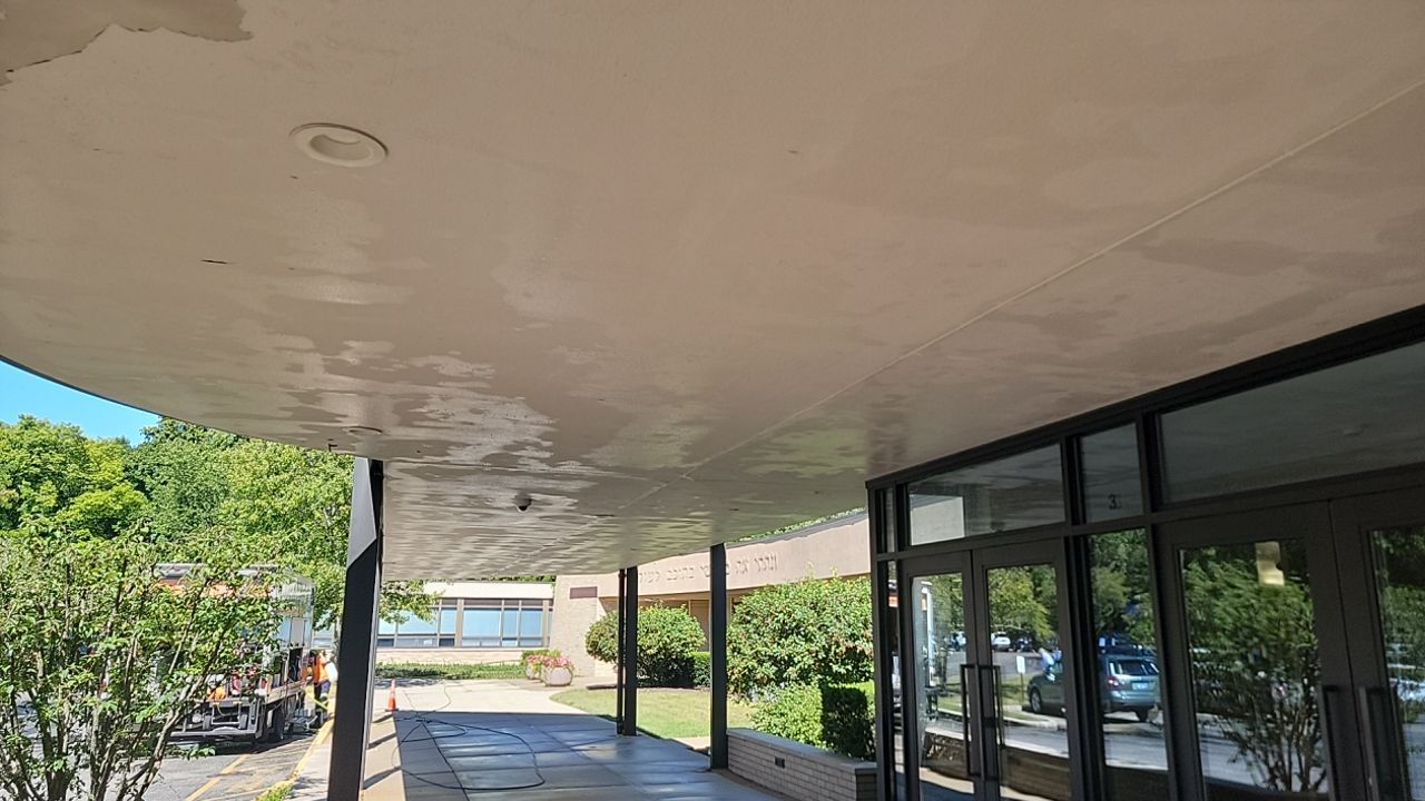 commercial pressure washing using Algaecide, soft wash soap by Northern Power Washing LLC.