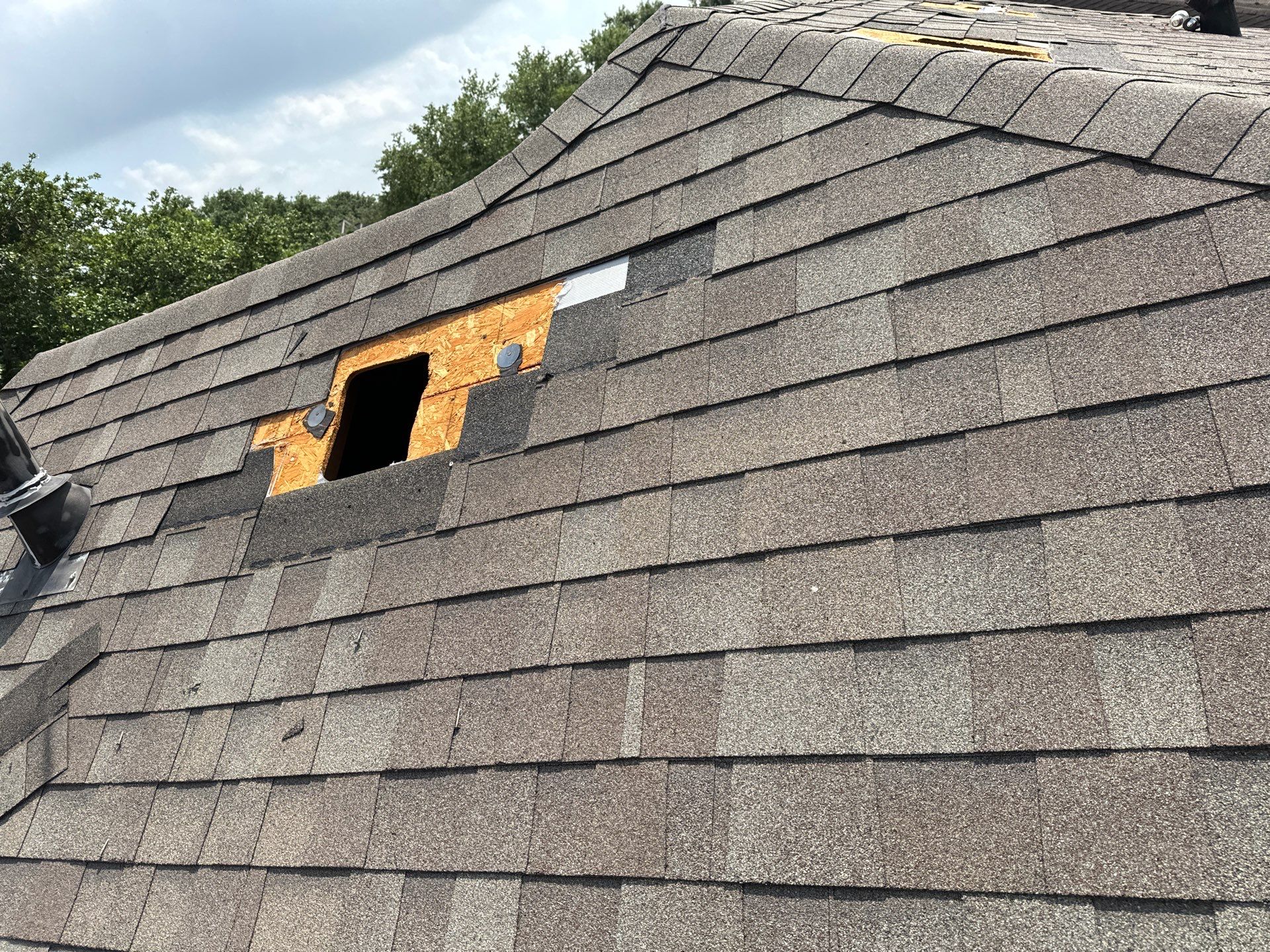 Hail Damage using Owen's Corning Duration (Lifetime) Shingles by Roof Repair Company