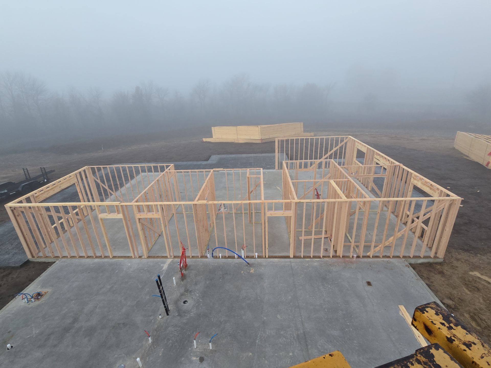 New Home construction w/ board and batten sides and metal roof  by Miles Construction 
