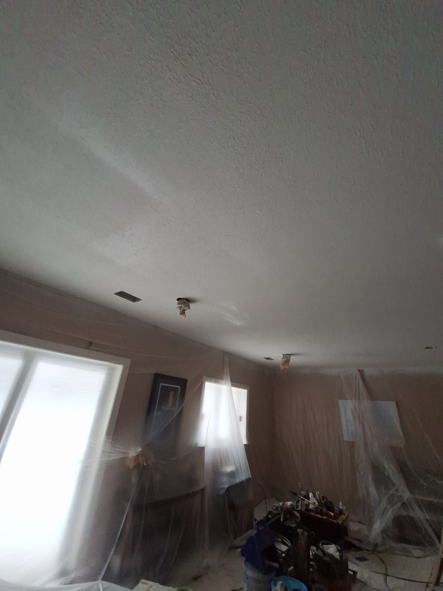 Basement Ceiling & Wall Repair + Interior Painting in Grand Haven, Michigan by Gordon Painting