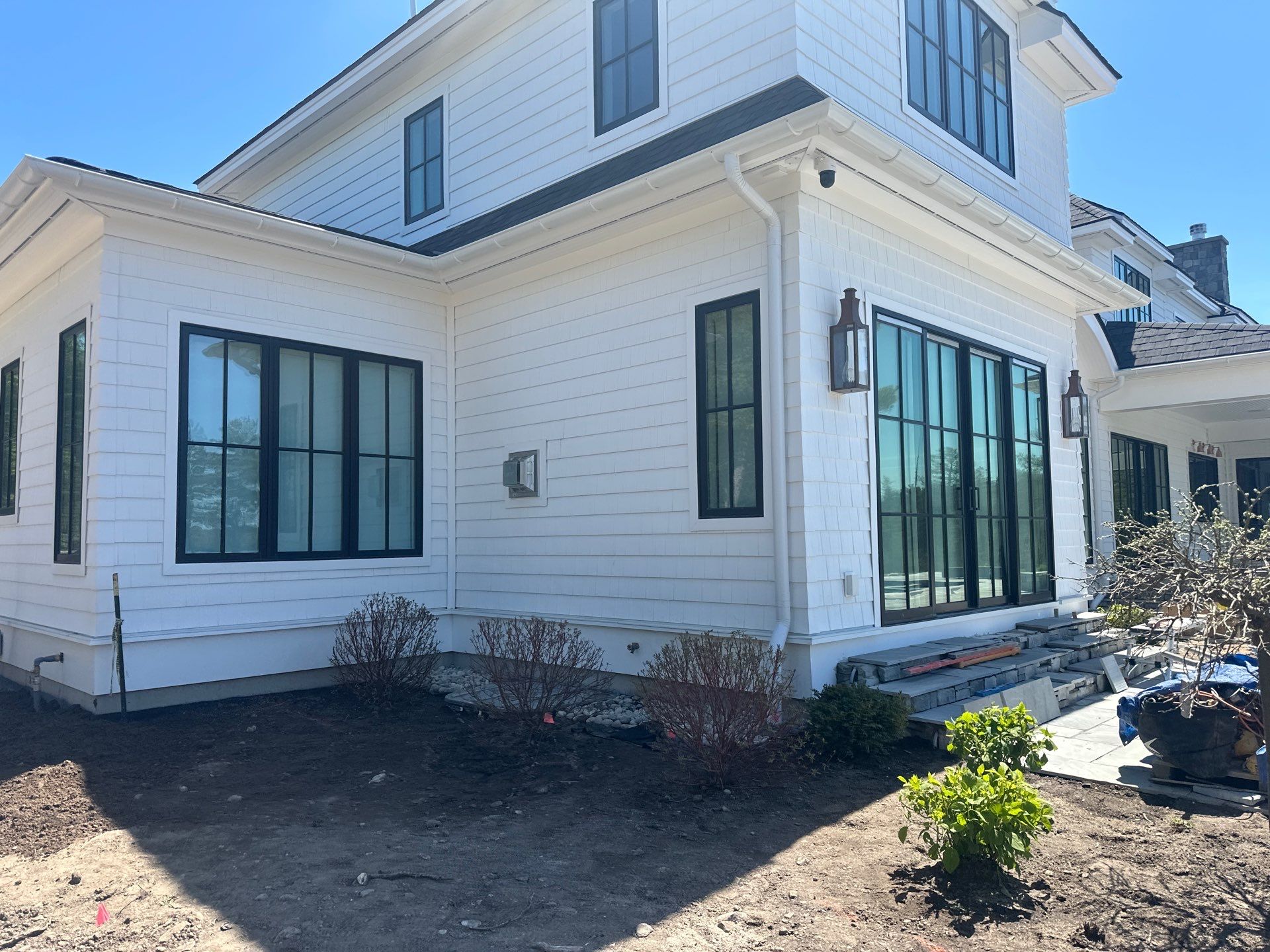 Gutter System and Exterior Drainage Installation in Charlevoix by Rainbow Seamless Systems
