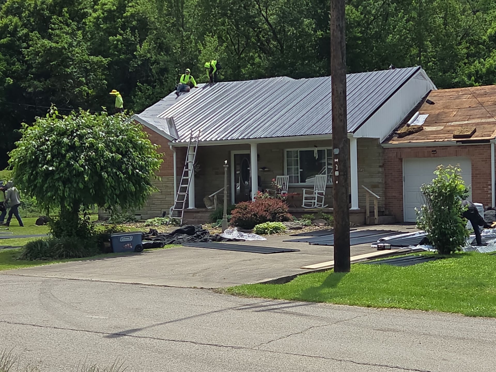Residential Roofing Installation using Metal by Mr. Roofer