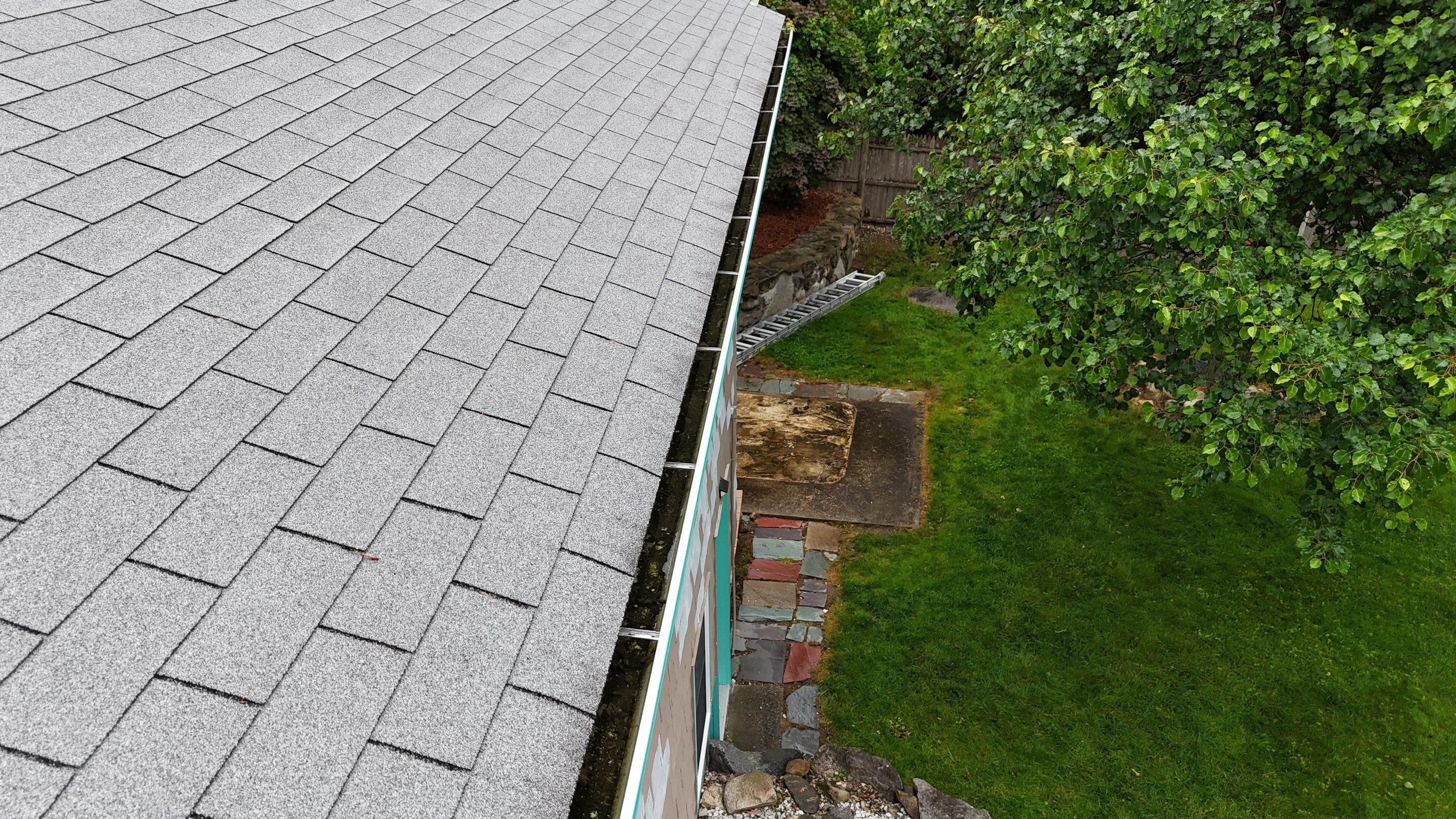 Roof Replacement with Gutter Guards – Westford, MA by Mighty Dog Roofing of Greater Middlesex County