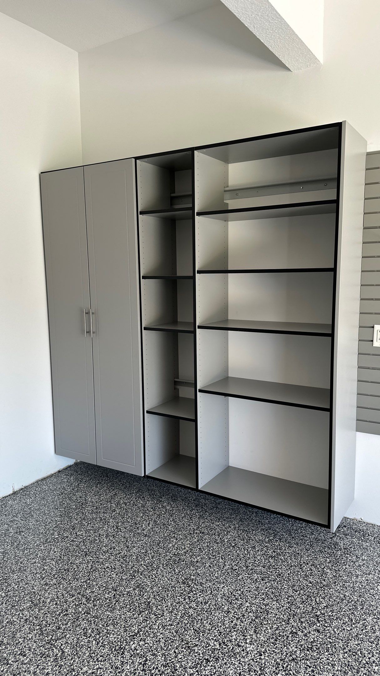 Laura B. garage transformation with a new floor and garage storage by Banner Garage