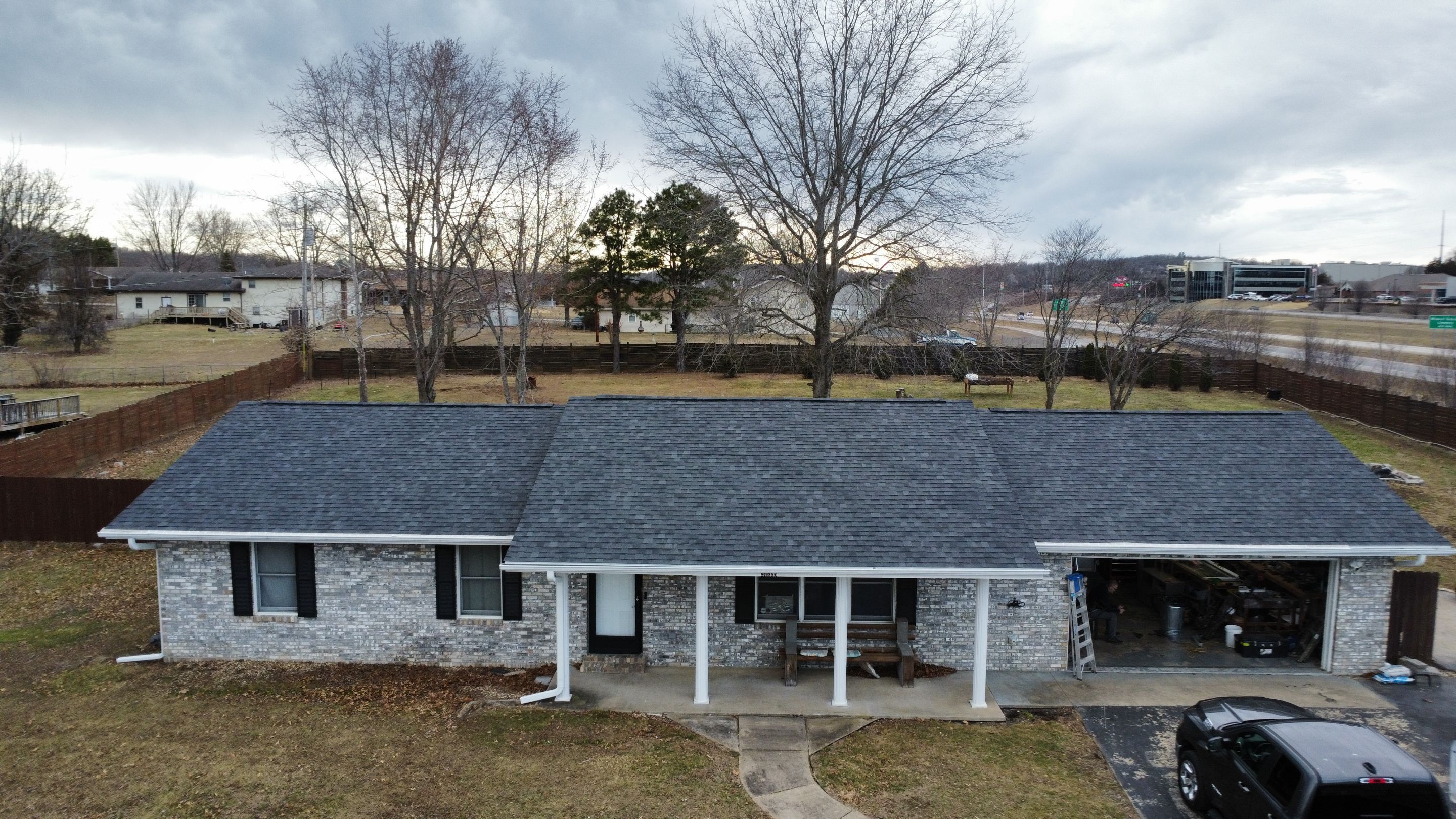 Residential Roofing & Downspouts Install  by Titan Commercial & Residential Roofing 