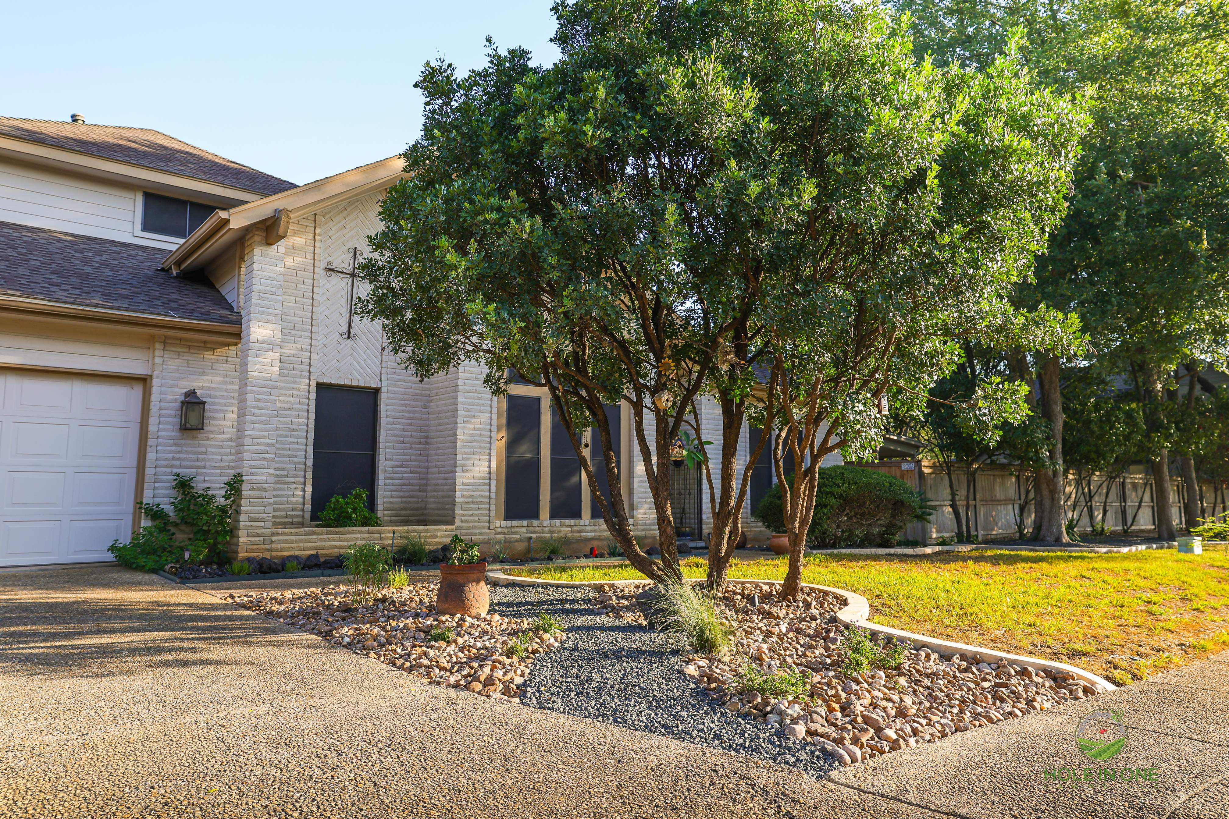 Henderson Pass, San Antonio Tx. by Hole In One Lawns, LLC
