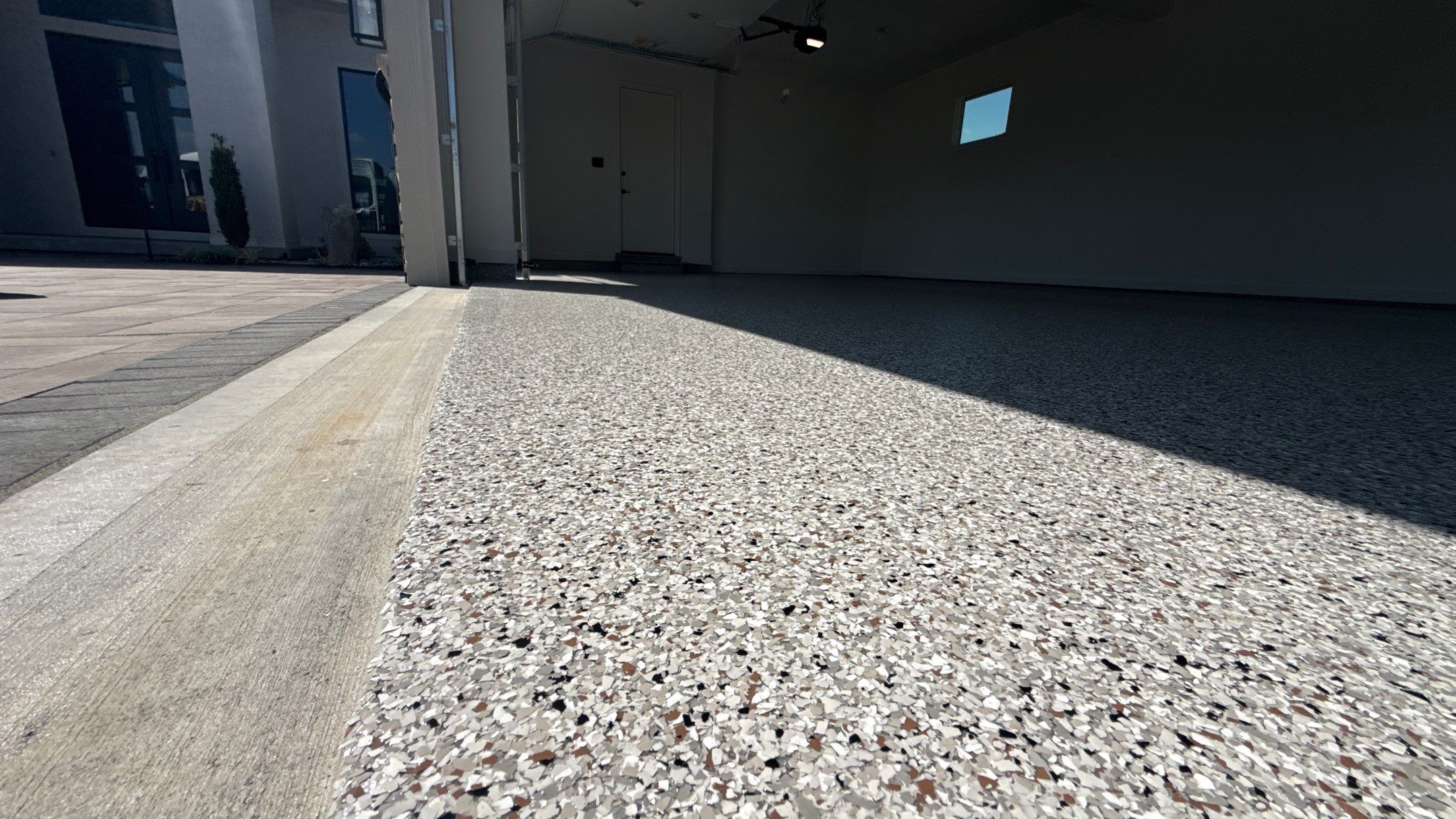 Custom Garage Epoxy Flake Floor Coating in Leawood by Banner Garage
