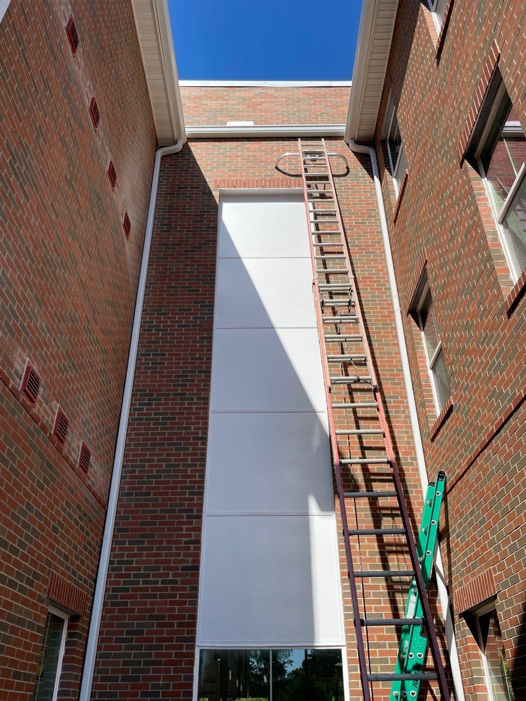 Commercial Roofing Installation using Owens Corning Duration Estate Gray by Nitro Roofing and Construction