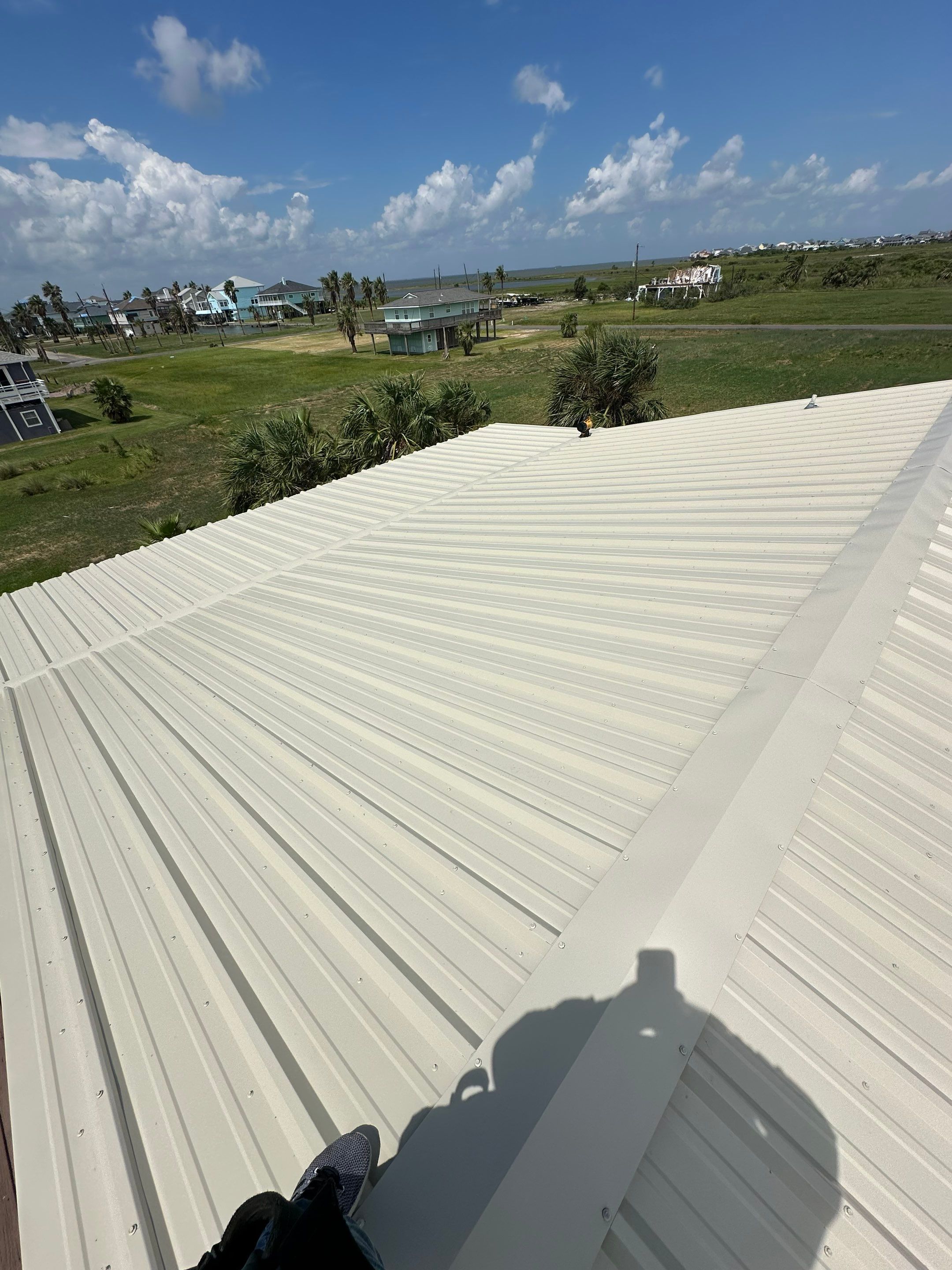 Residential Roofing Installation using R-Panel Metal Roofing on Galveston Island by Core Four Roofing