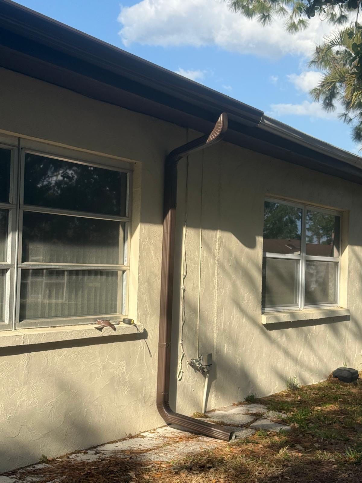 6 Inch Seamless Gutters using Musket Brown Seamless Gutters in Sarasota FL by Gutter Professors