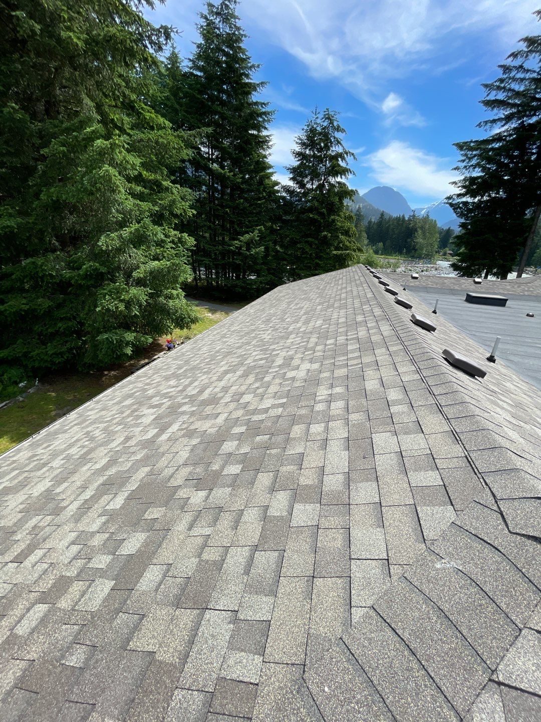 Residential ReRoofing Installation using OC Oakridge shingles by Top Notch Roofing Inc