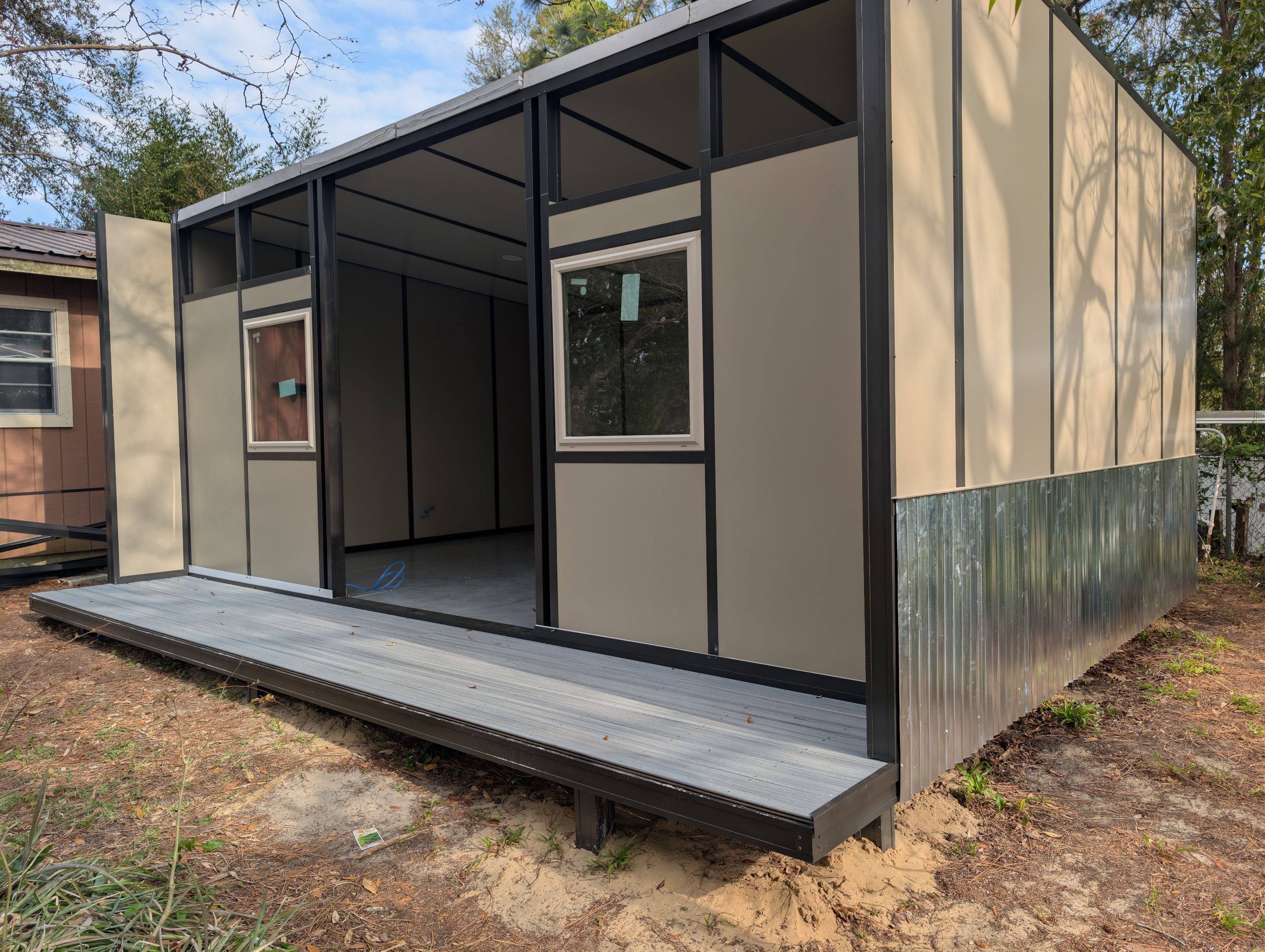 Titan Blockhouse Backyard Home Addition by Titan Sunrooms