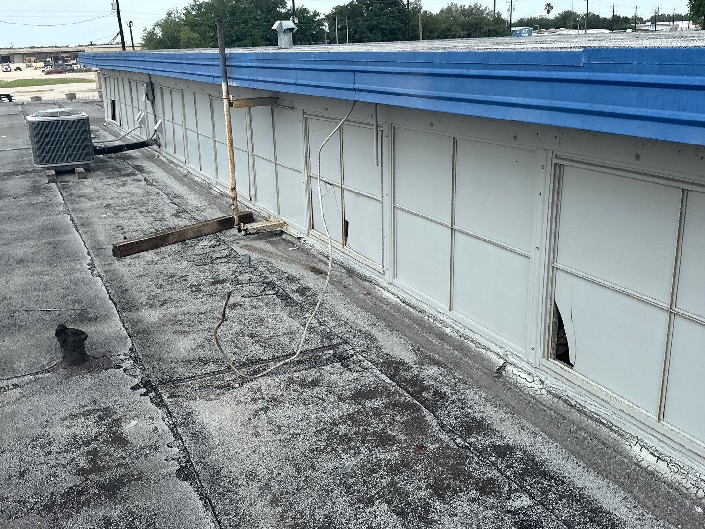 Commercial Silcone Roof Repair using Silcone Coating by Galvan Roofing and Construction