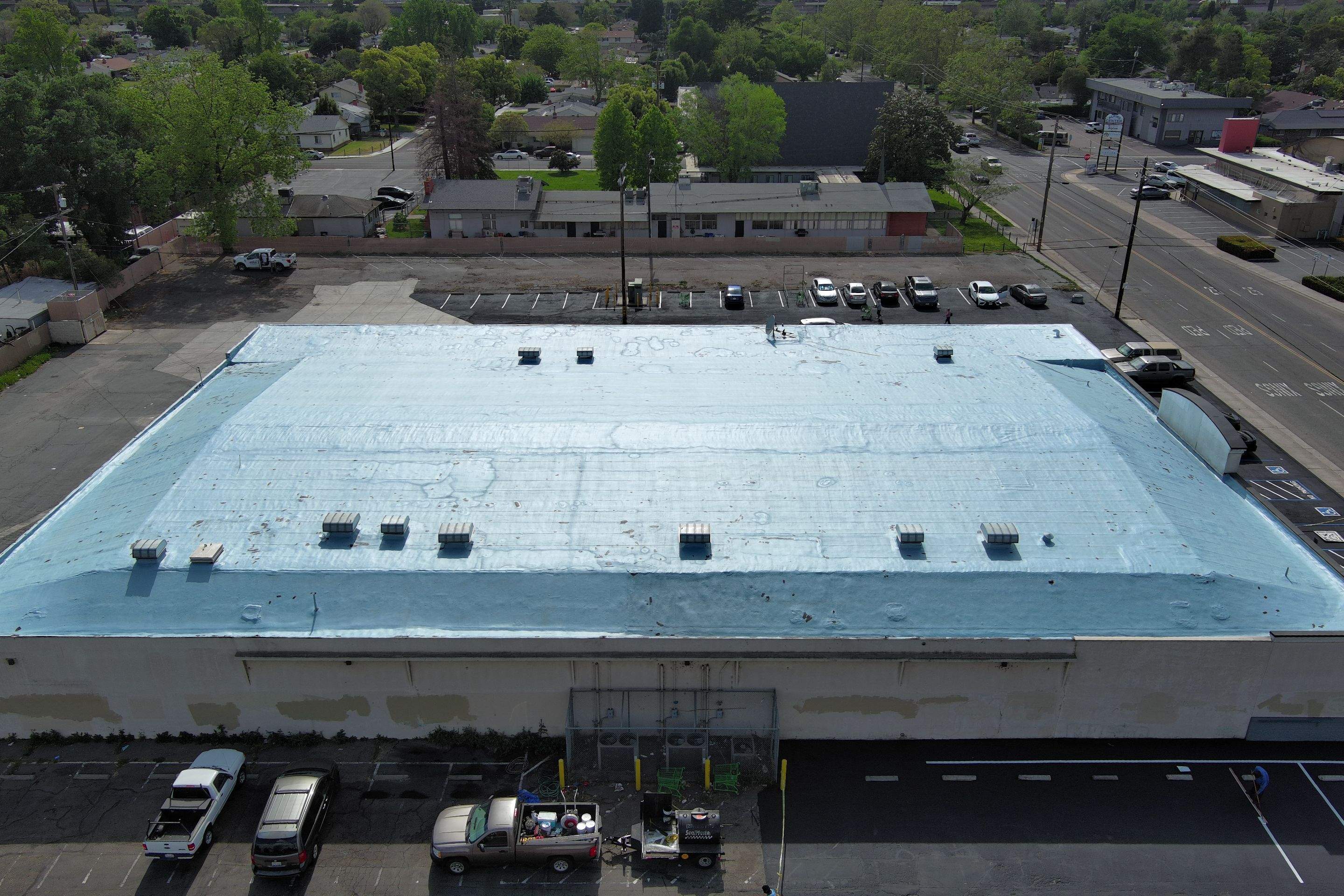 Foam Refurbish using Conklin Benchmark/PUMA XL coatings and spray foam by Straight Edge Roofing Inc