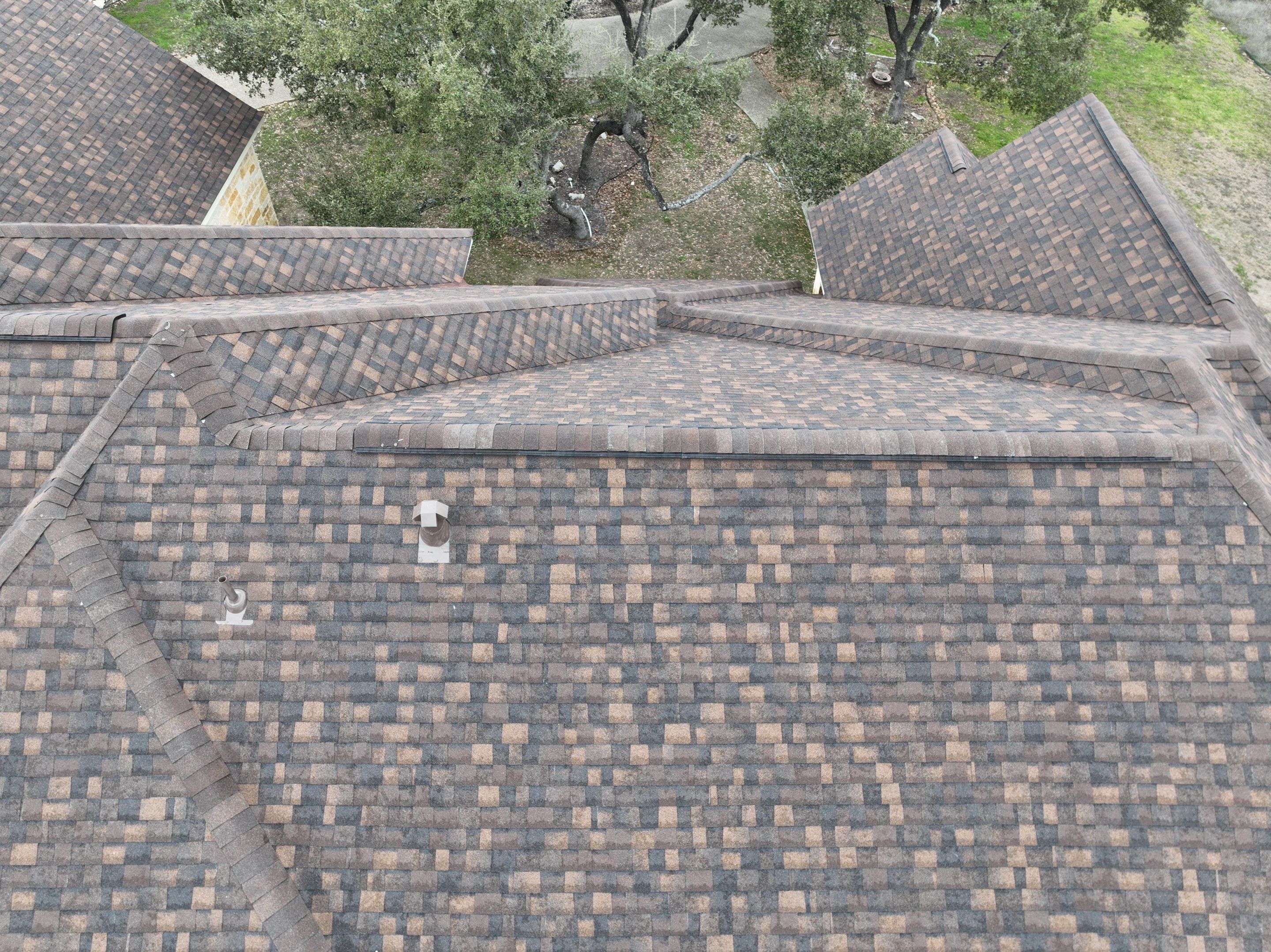 Residential Roof Replacement using 30 Year Laminate Shingles with High Profile Ridge by Premier Roofing and Contracting