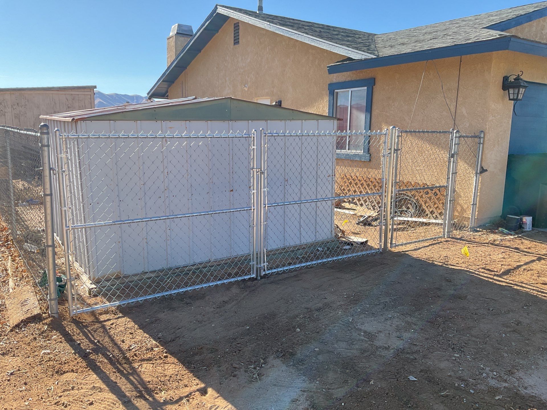 Chain-link gate installation  by Fence Guys Inc. 