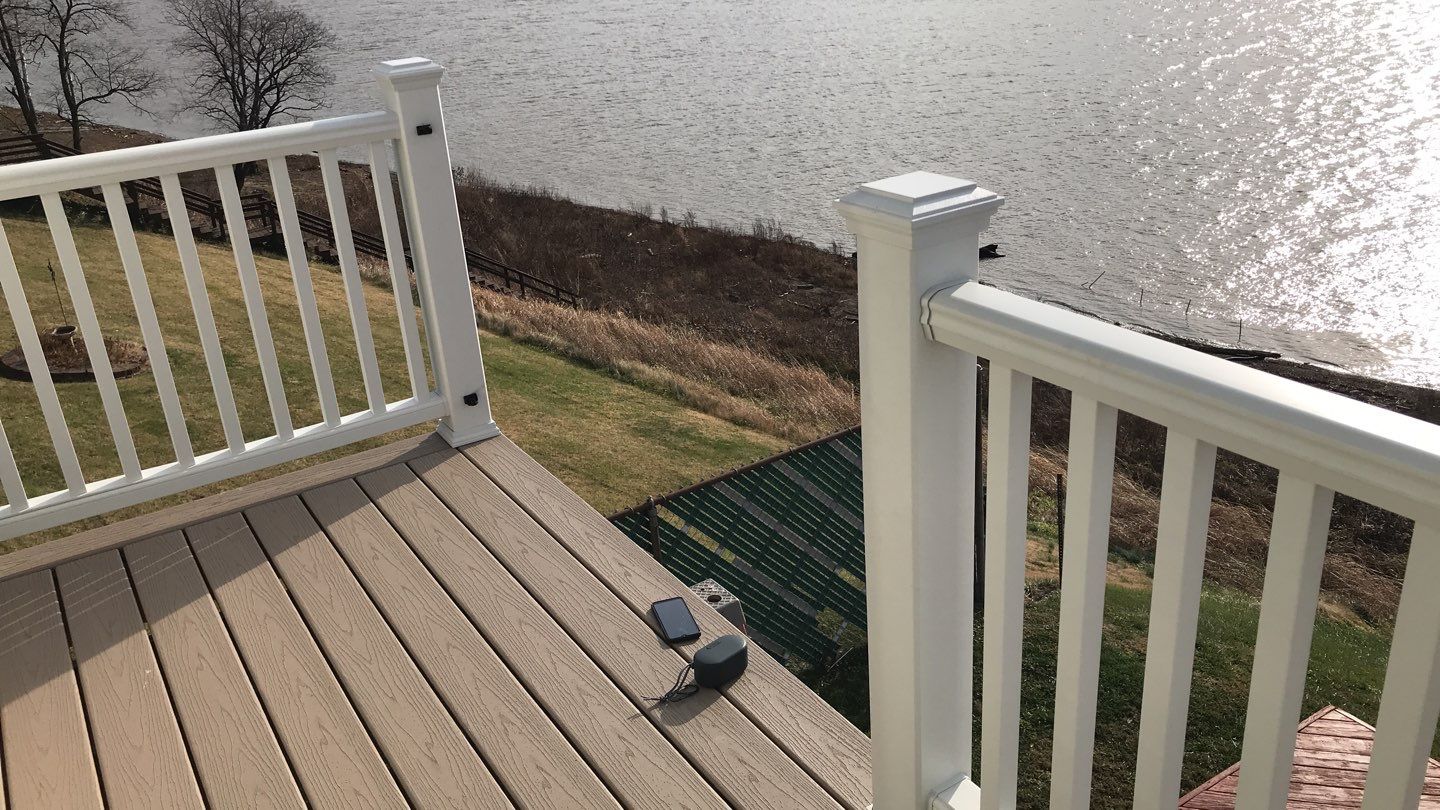 Deck Refurbush and Door Replacement using Trex Decking and Railing.  Polaris Patio Doors by Secure Construction Company Inc