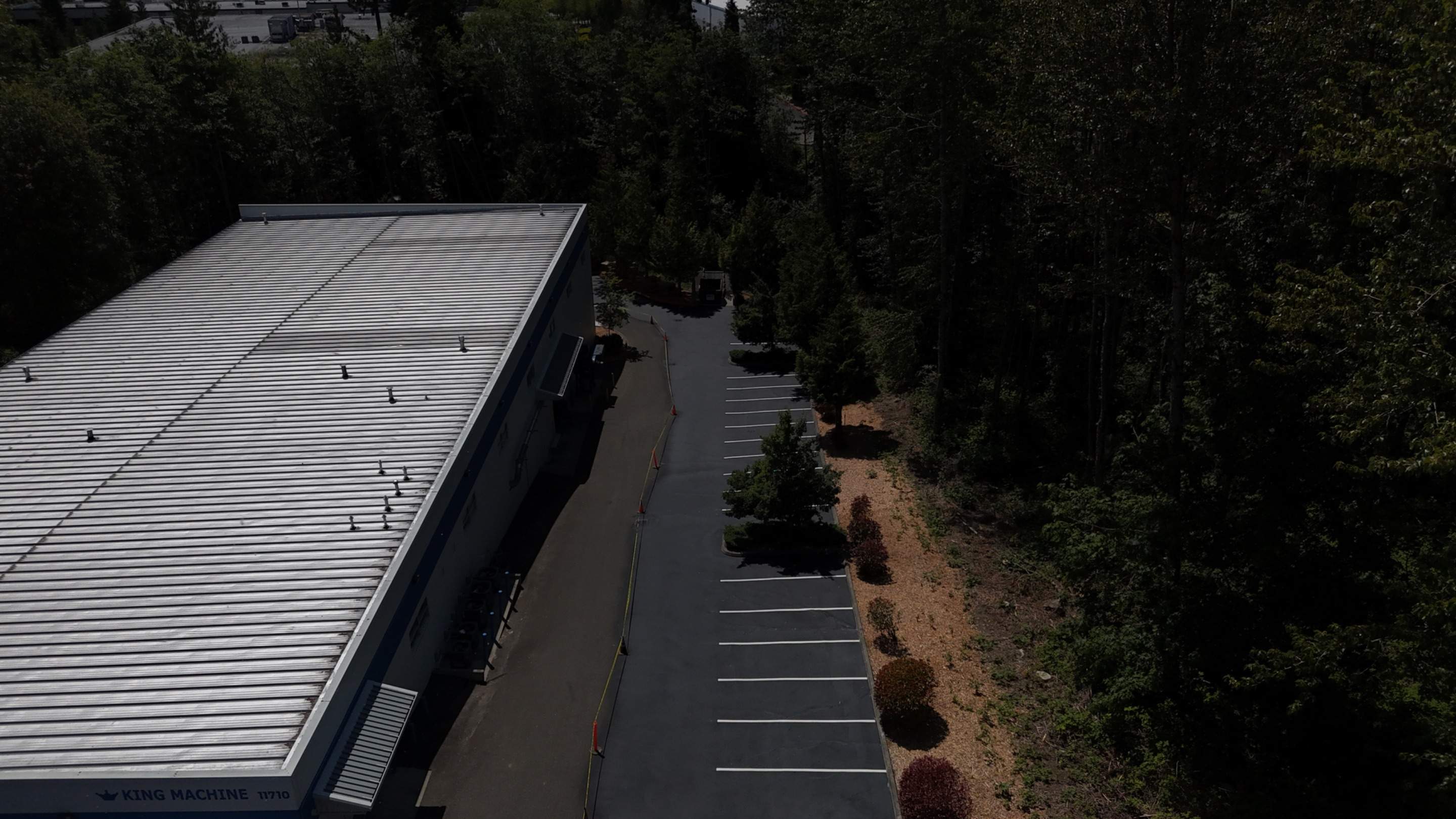 King Machine Business Parking Lot Sealcoat Overlay | Mukilteo by Jireh Asphalt & Concrete Inc 