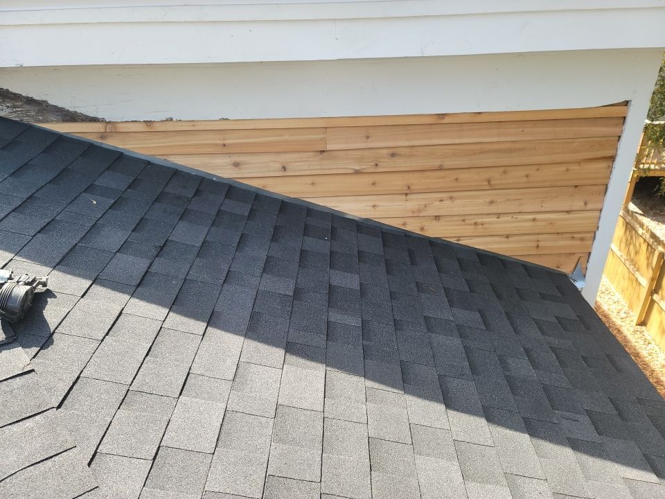 Residential Roofing Installation using Roof Replacement by American Roofing & Construction LLC