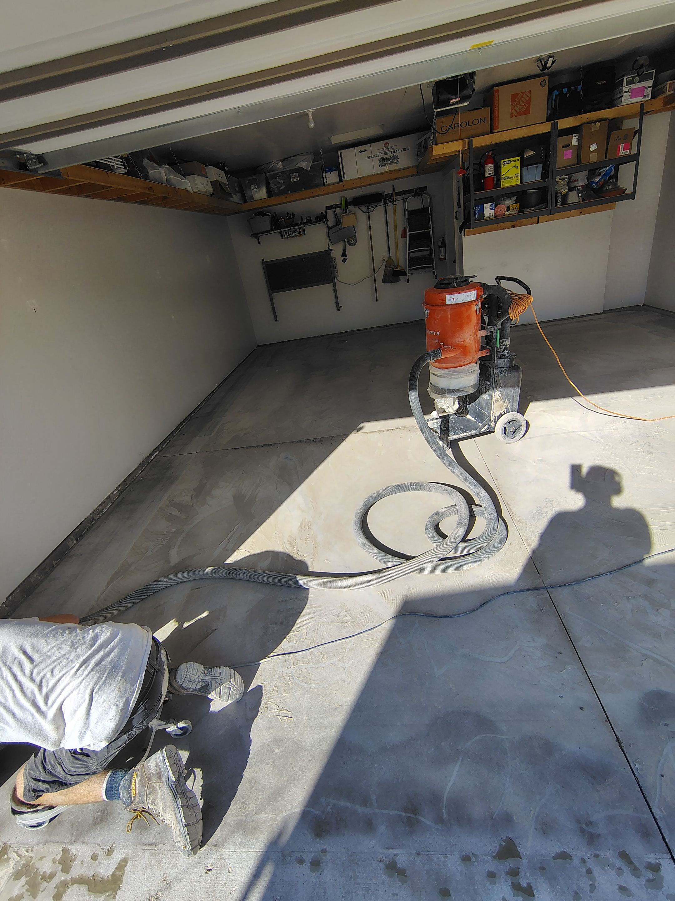 Decorative Chip Garage Concrete Coating Installation in Sioux Falls by Select Painting, Coatings & Garage Cabinets
