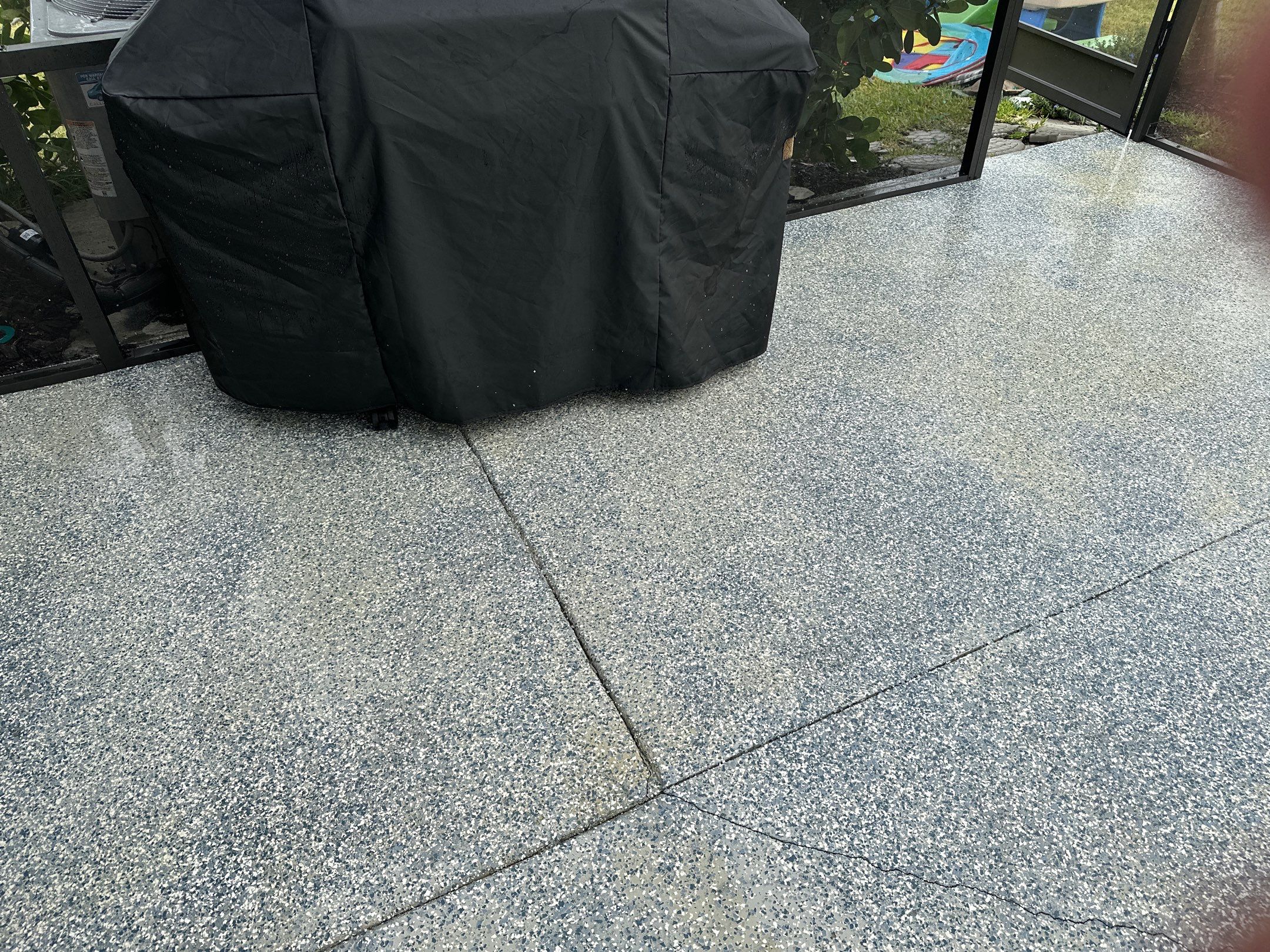 Lanai & Patio Cleaning with Epoxy-Coated Concrete Floor in Trevesta Community, Palmetto, FL | Sunshine AquaWash by Sunshine AquaWash