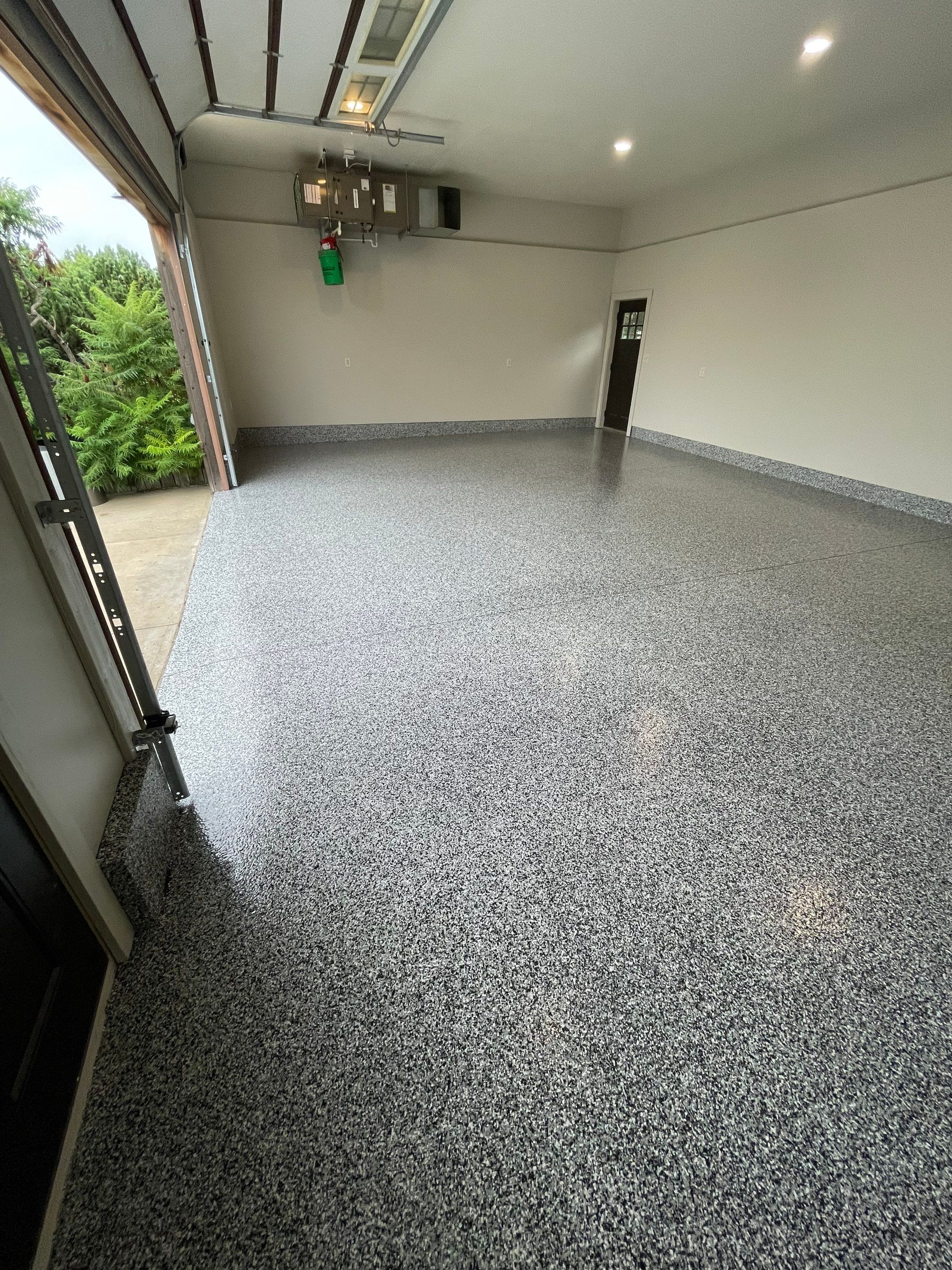 Domino Flake Floor Coating and Crack Repair in Chancellor by Select Painting, Coatings & Garage Cabinets