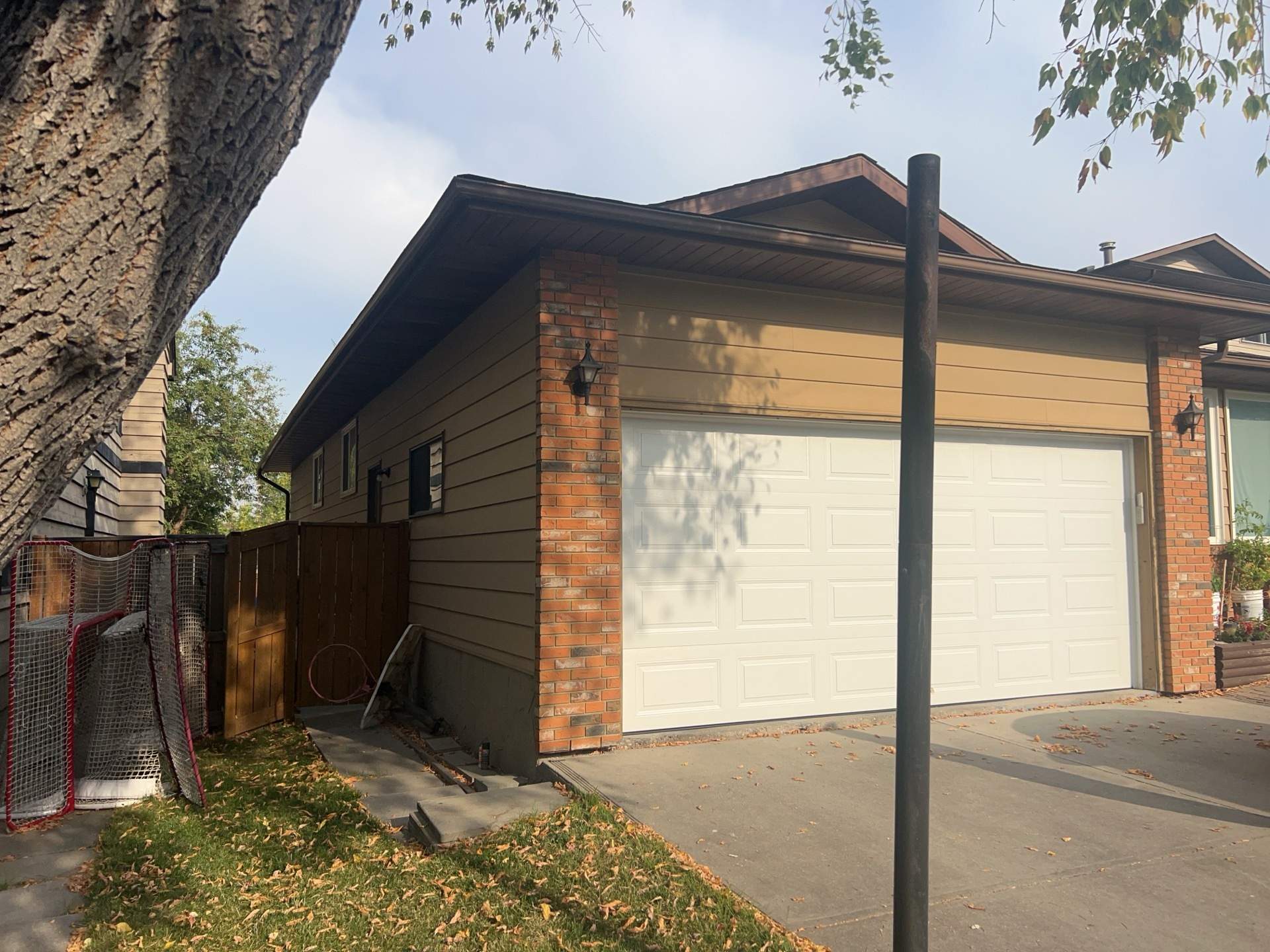 Calgary Chimney Chase Reconstruction and Exterior Siding Replacement by Smart Home Building Systems Ltd.