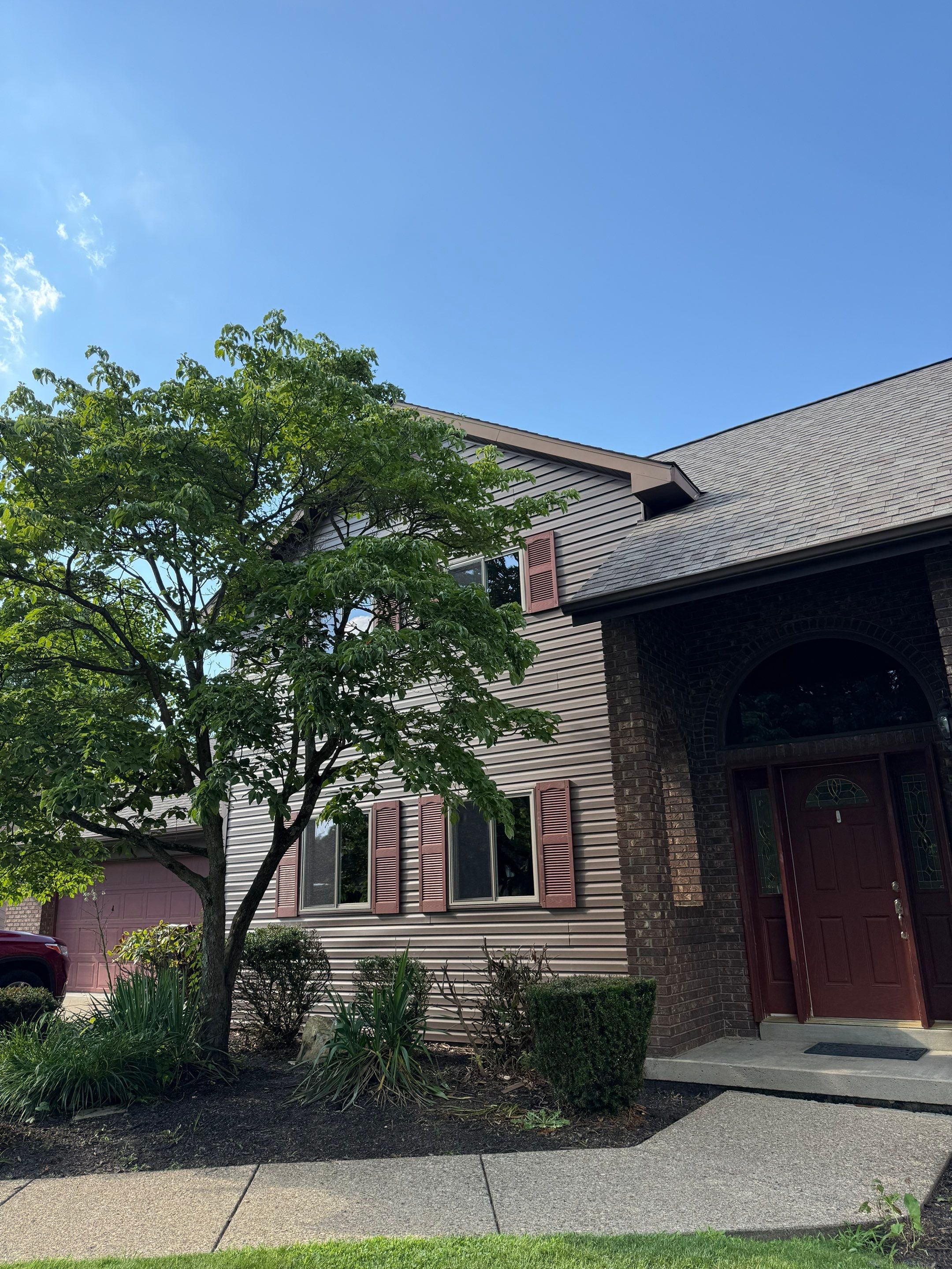 Siding and windows  by Cousins Roofing Siding & Decks