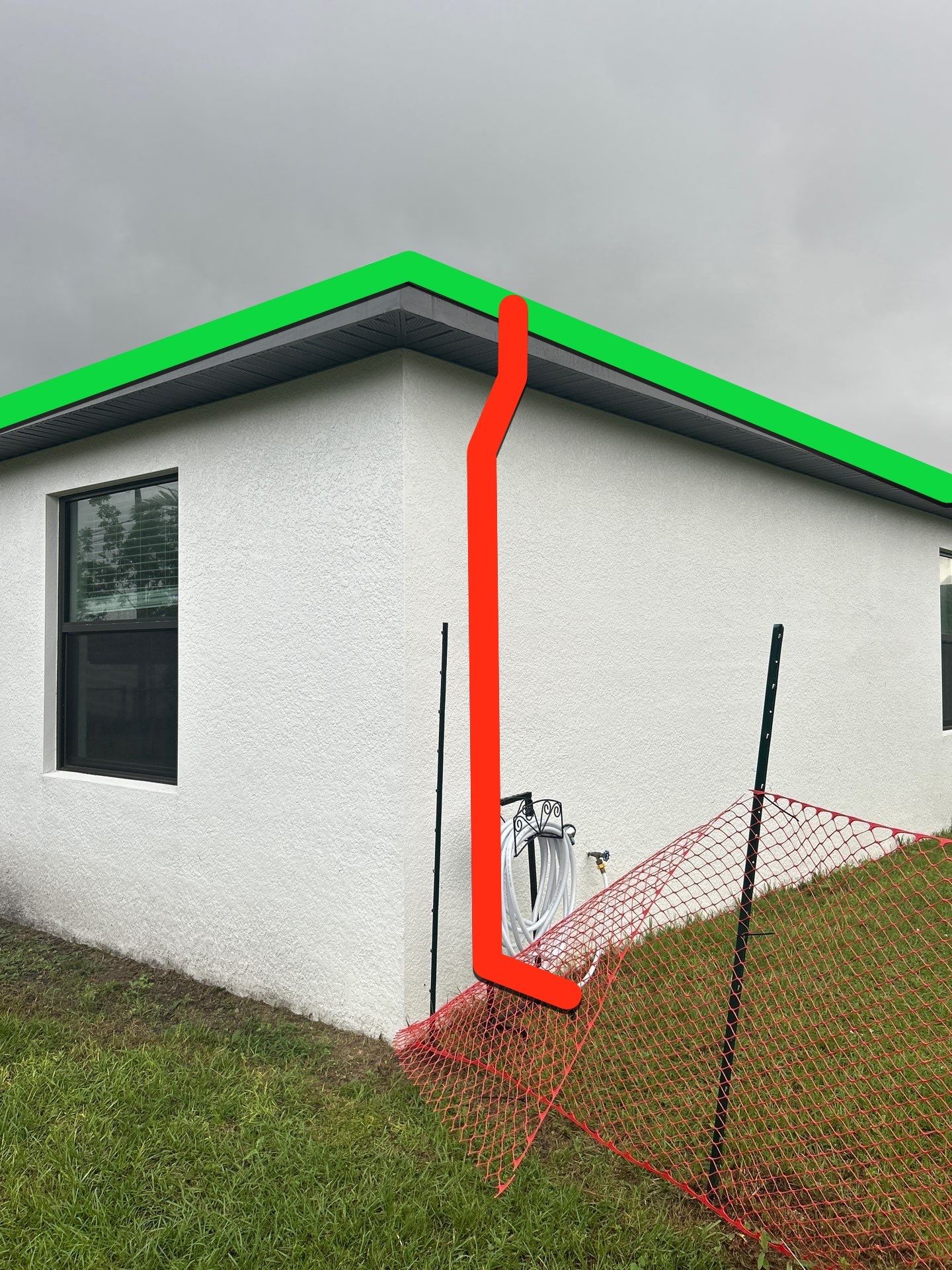 Dark Seamless Gutters and Downspouts in Cape Coral FL by Gutter Professors