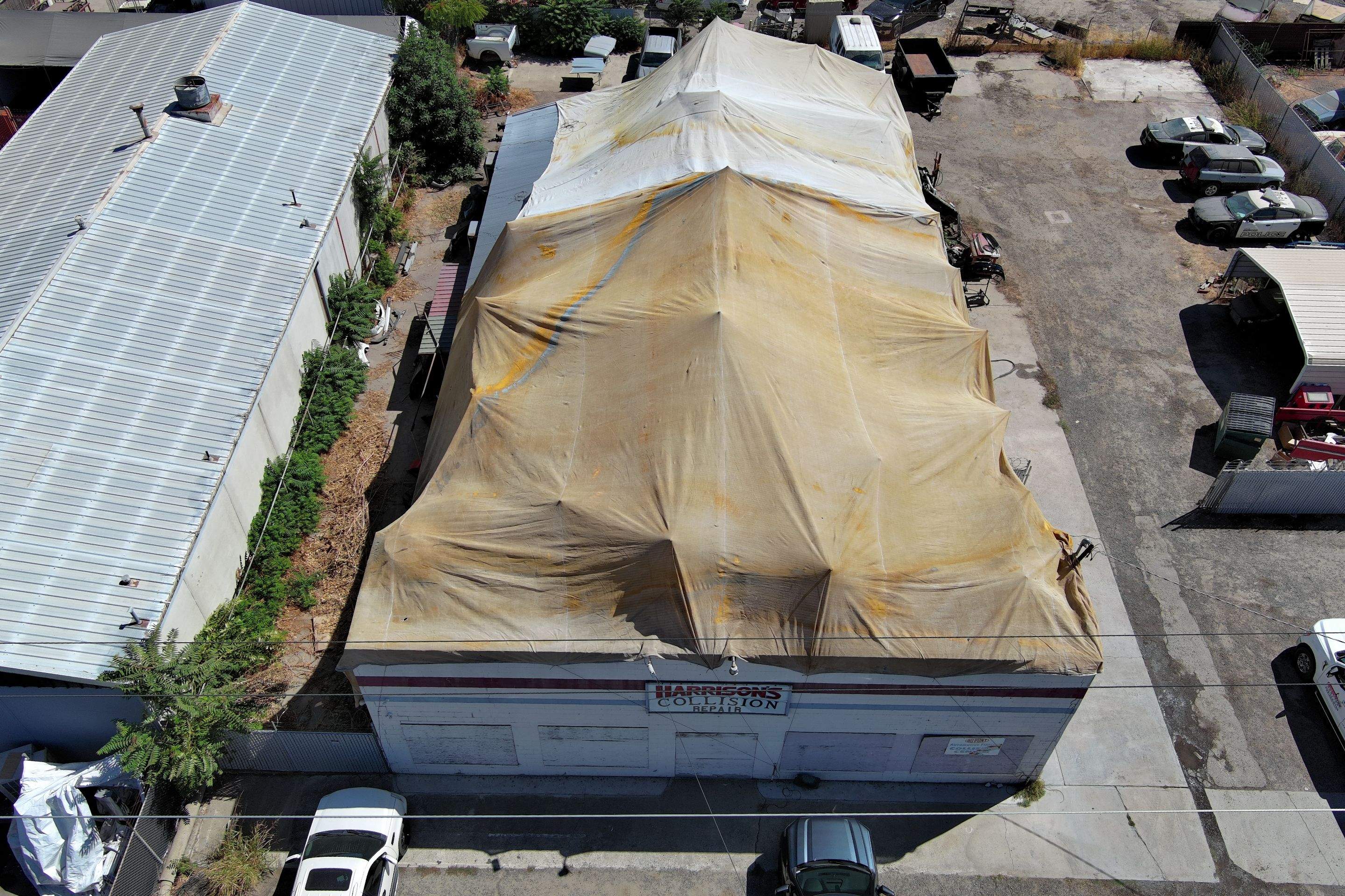 Spray foam and coatings using Conklin Benchmark/ PUMA XL acrylic coatings over metal and foam by Straight Edge Roofing Inc