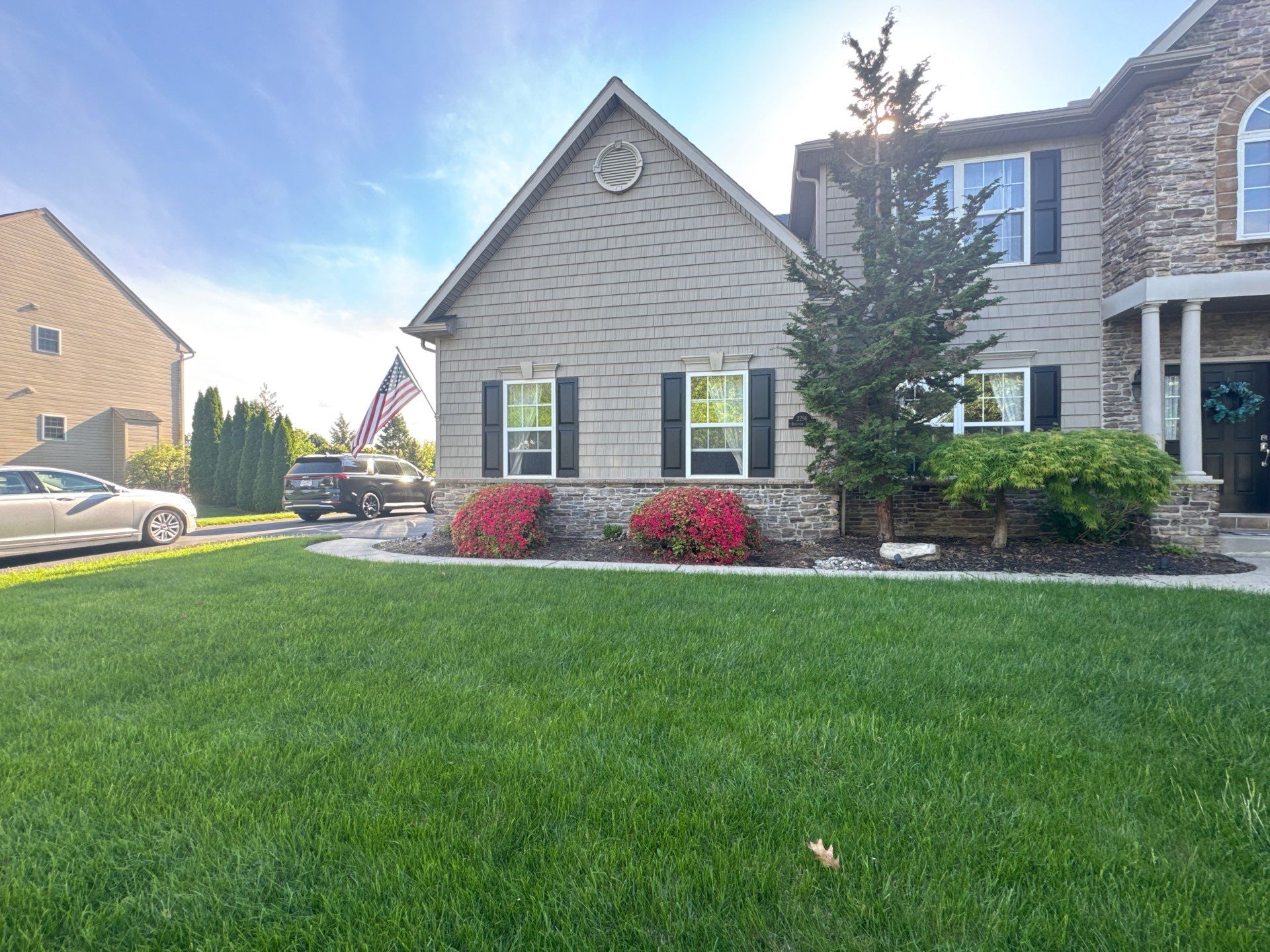 Backyard Retreat: Techo-Bloc Patio + Firepit Lounge by Saylor’s Lawn & Landscape
