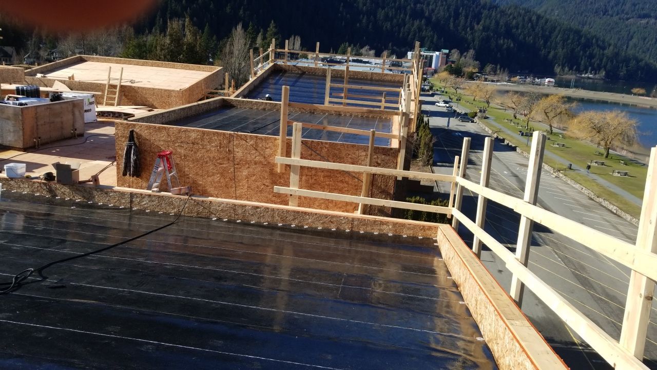 Commercial Roofing Installation using IKO 2ply sbs  by Top Notch Roofing Inc