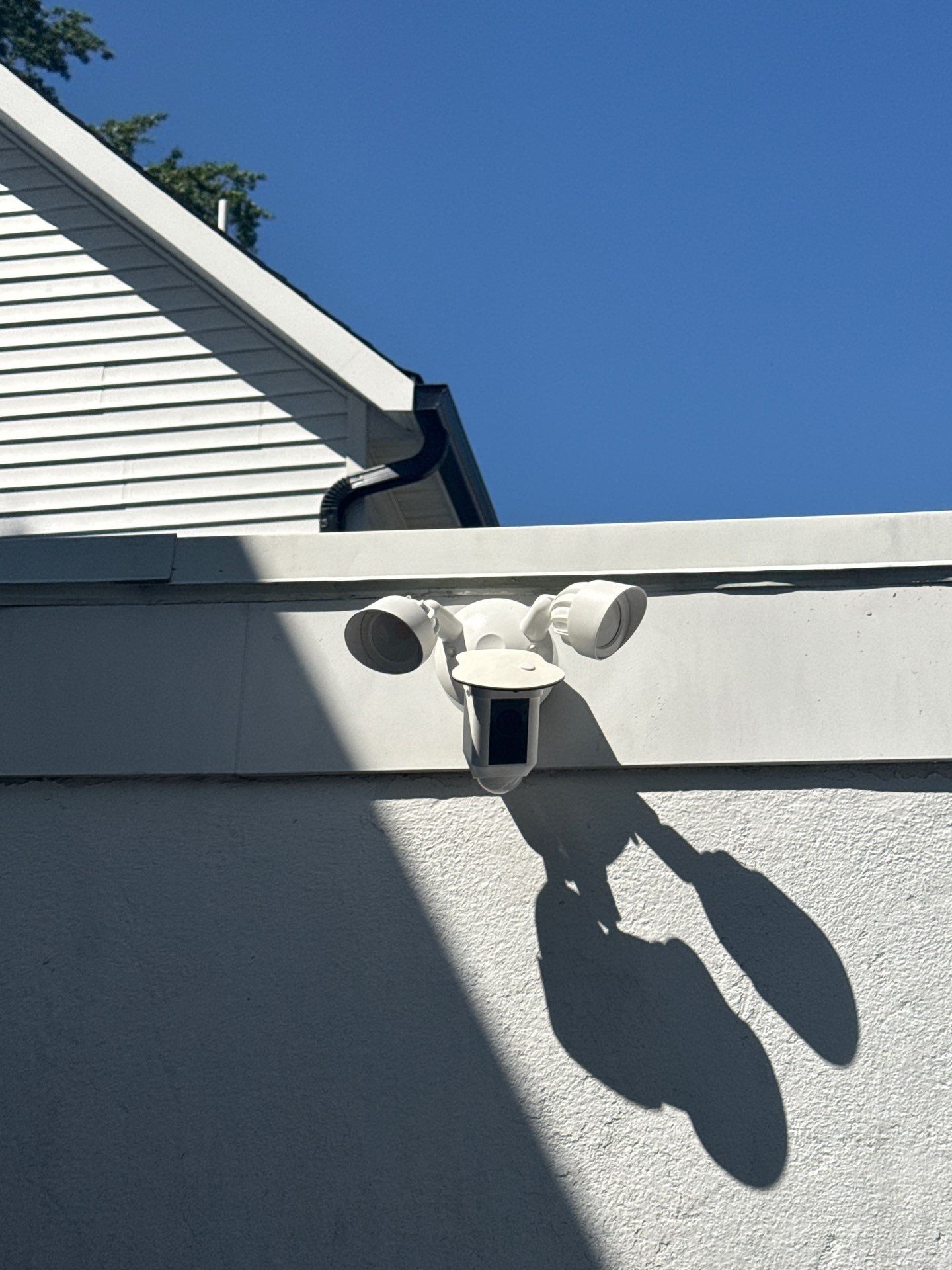 Exterior Switch, Garage Lighting, Ductless Mini-Split & Smart Security Floodlight Install by Spartan Home Pros