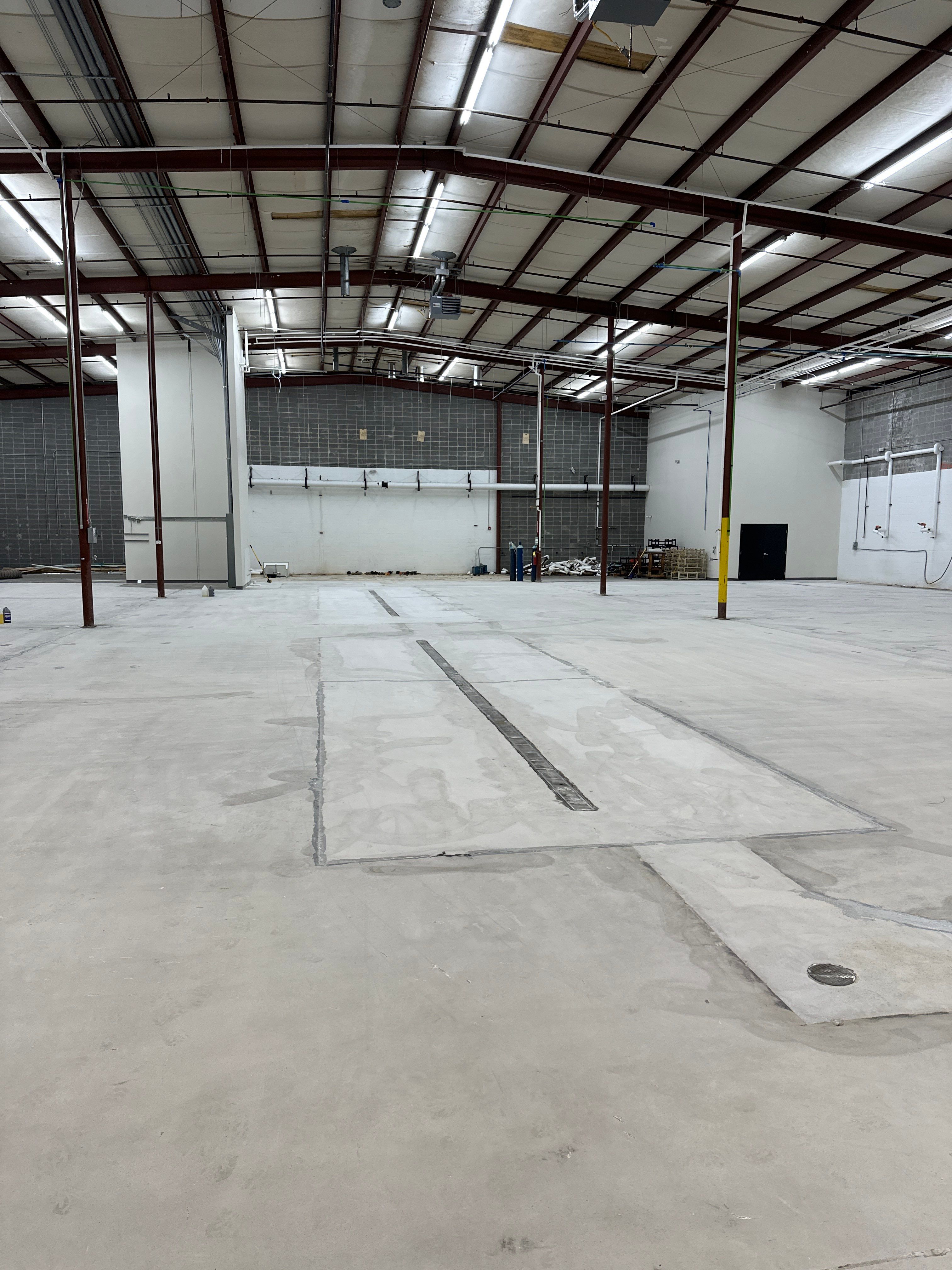 High-Gloss Industrial Epoxy Flooring Installation in Tucker, Georgia by Cornerstone Hard Surface Restoration