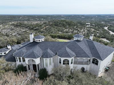 Residential Roof Replacement using 30 Year Laminate Shingles with High Profile Ridge