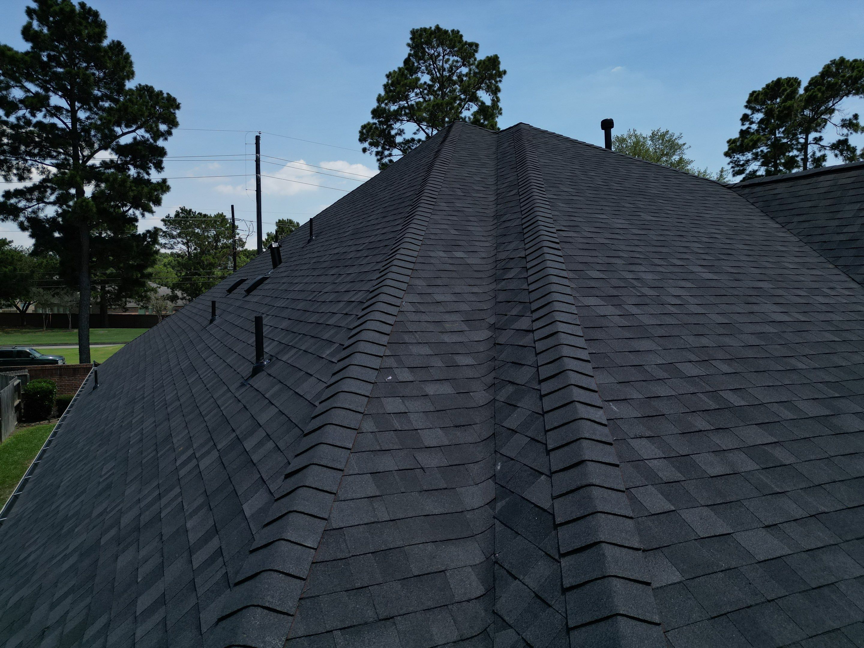 OC Duration Onyx Black by HHH Roofing & Construction