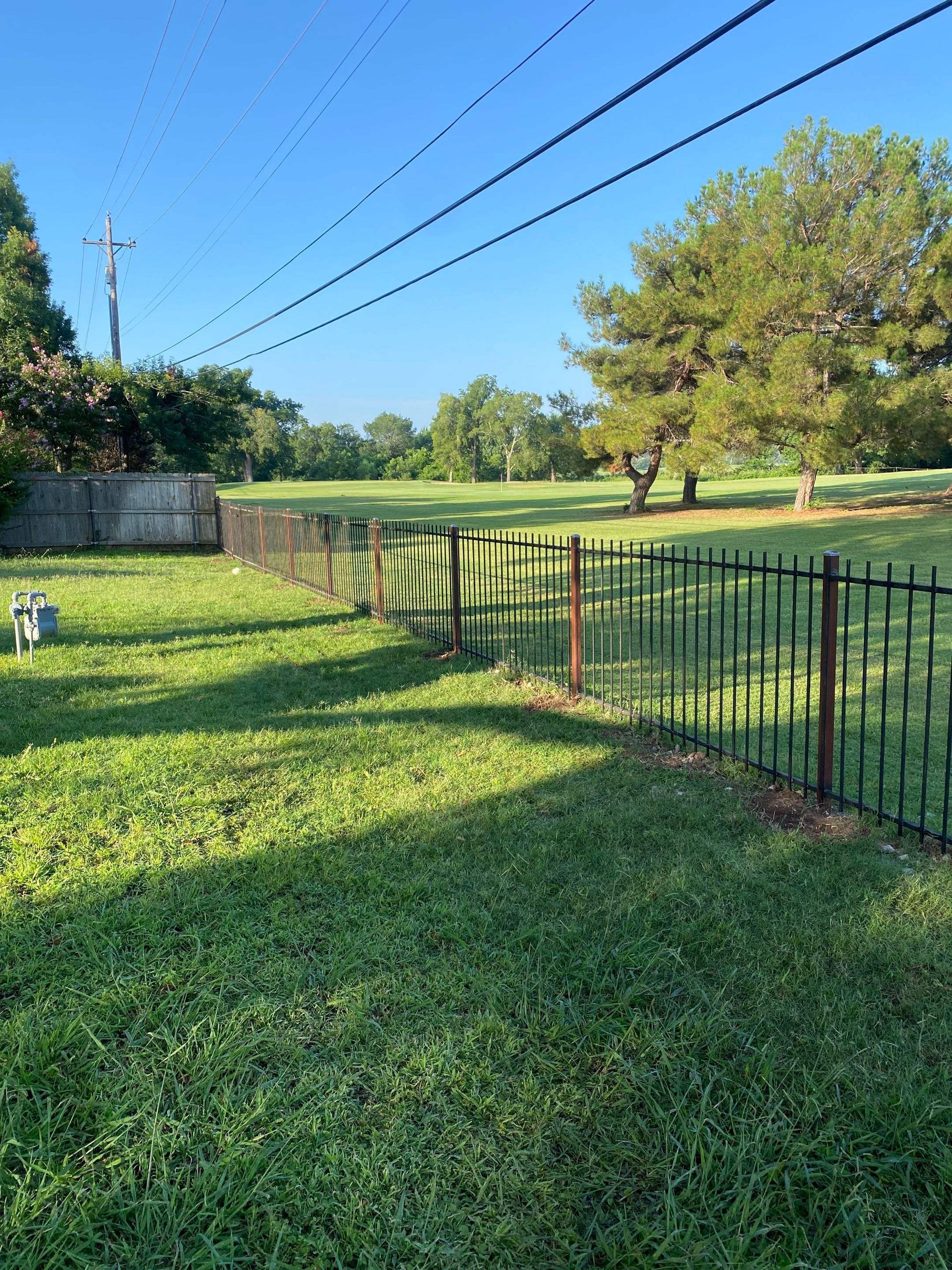 Custom Metal Fence Build by Clays Services Inc