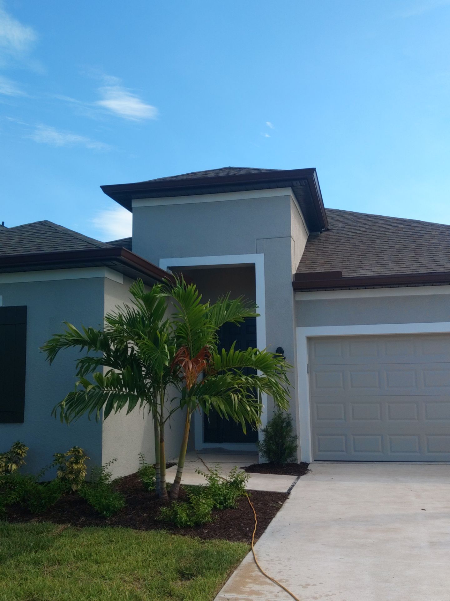 Musket Brown Seamless Gutters using Musket Brown Seamless Gutters in Nokomis FL by Gutter Professors