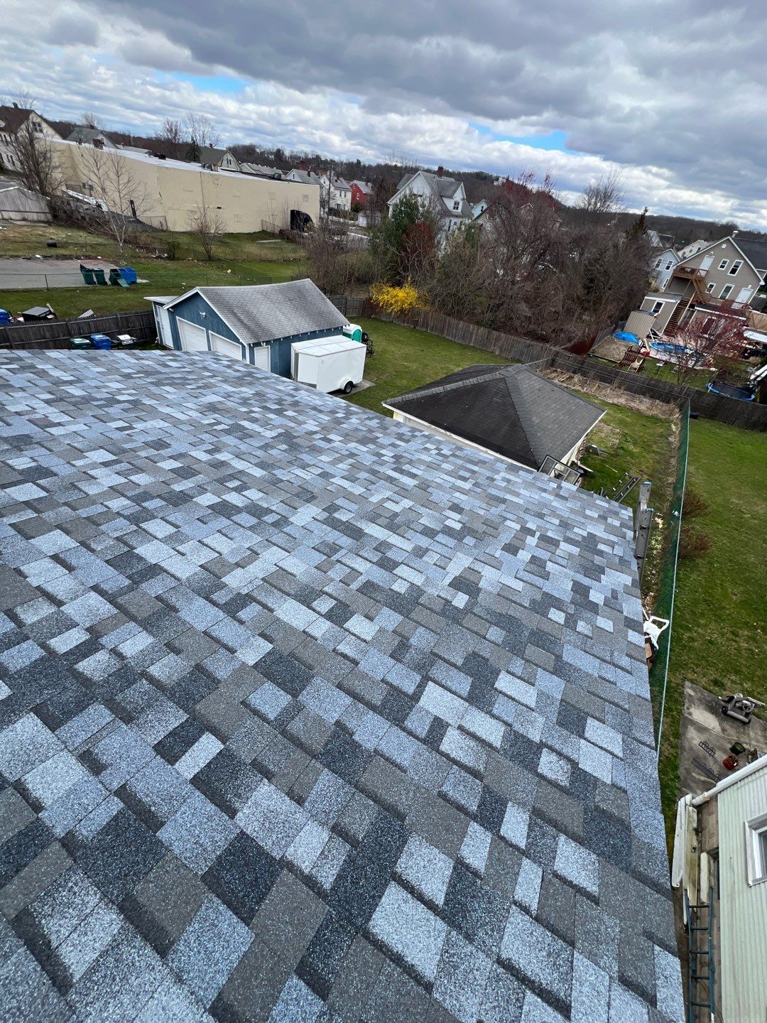 Atlantic Blue Shingles by Reimagine Roofing